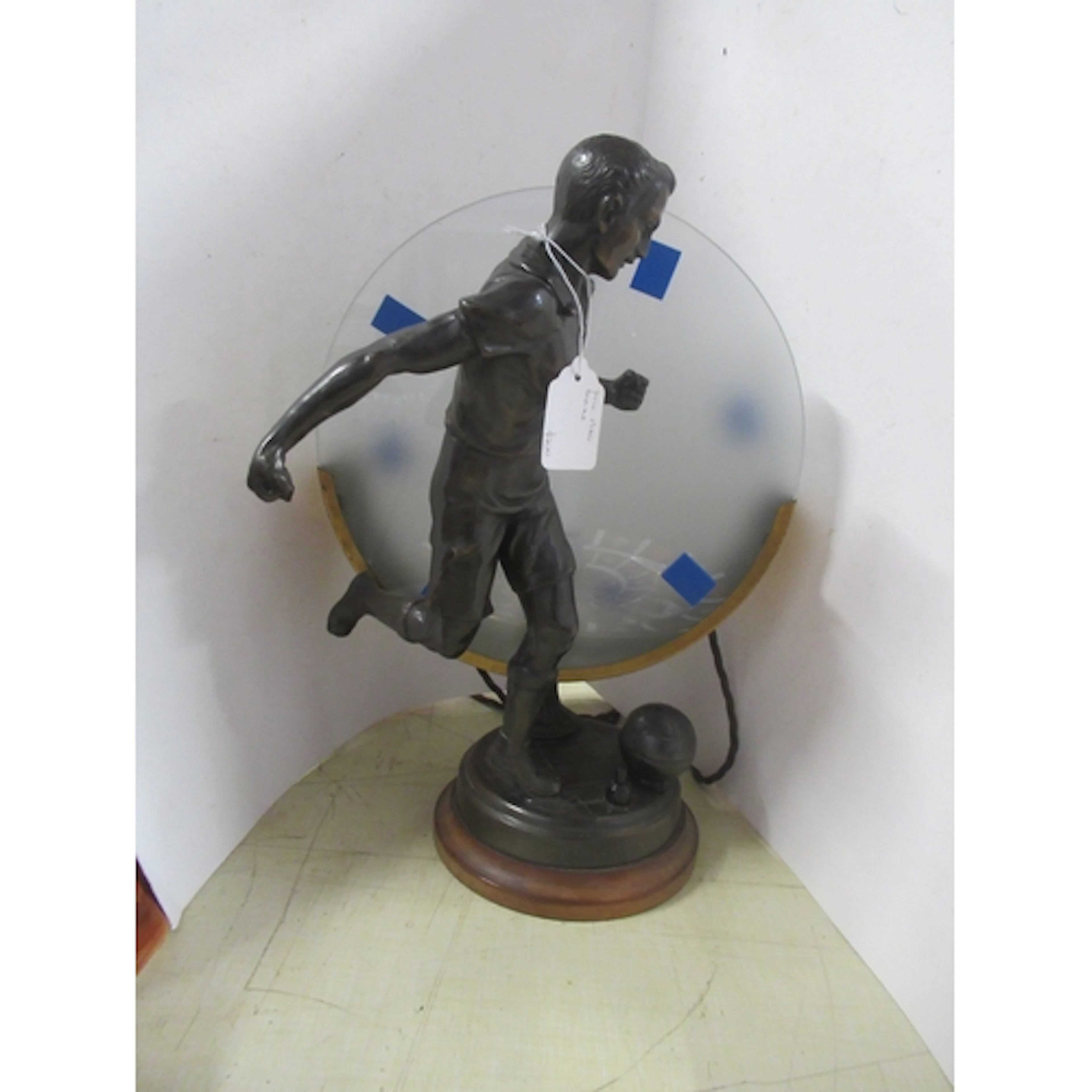 A table lamp, with frosted glass discs and mounted with a br...