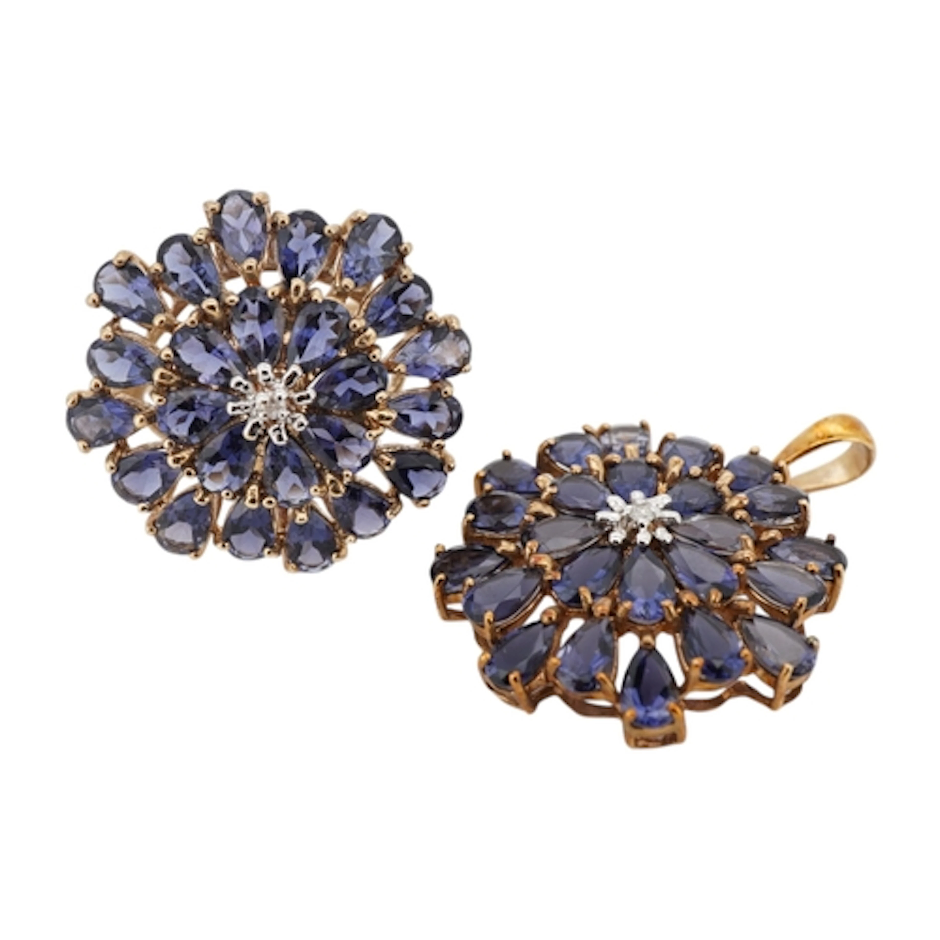 An iolite pendant and ring, each of cluster design, set with...
