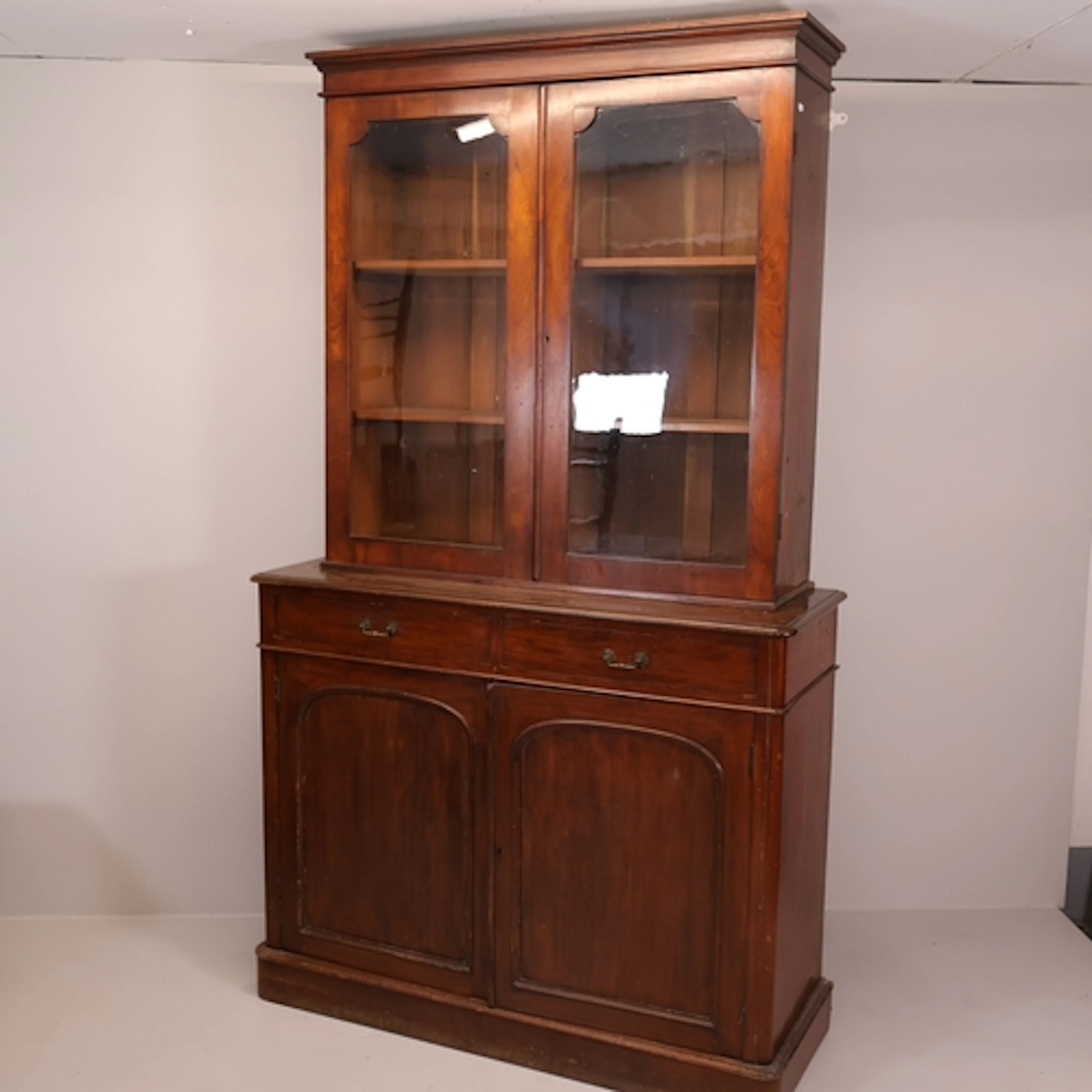 A Victorian mahogany two-section library bookcase, with two ...