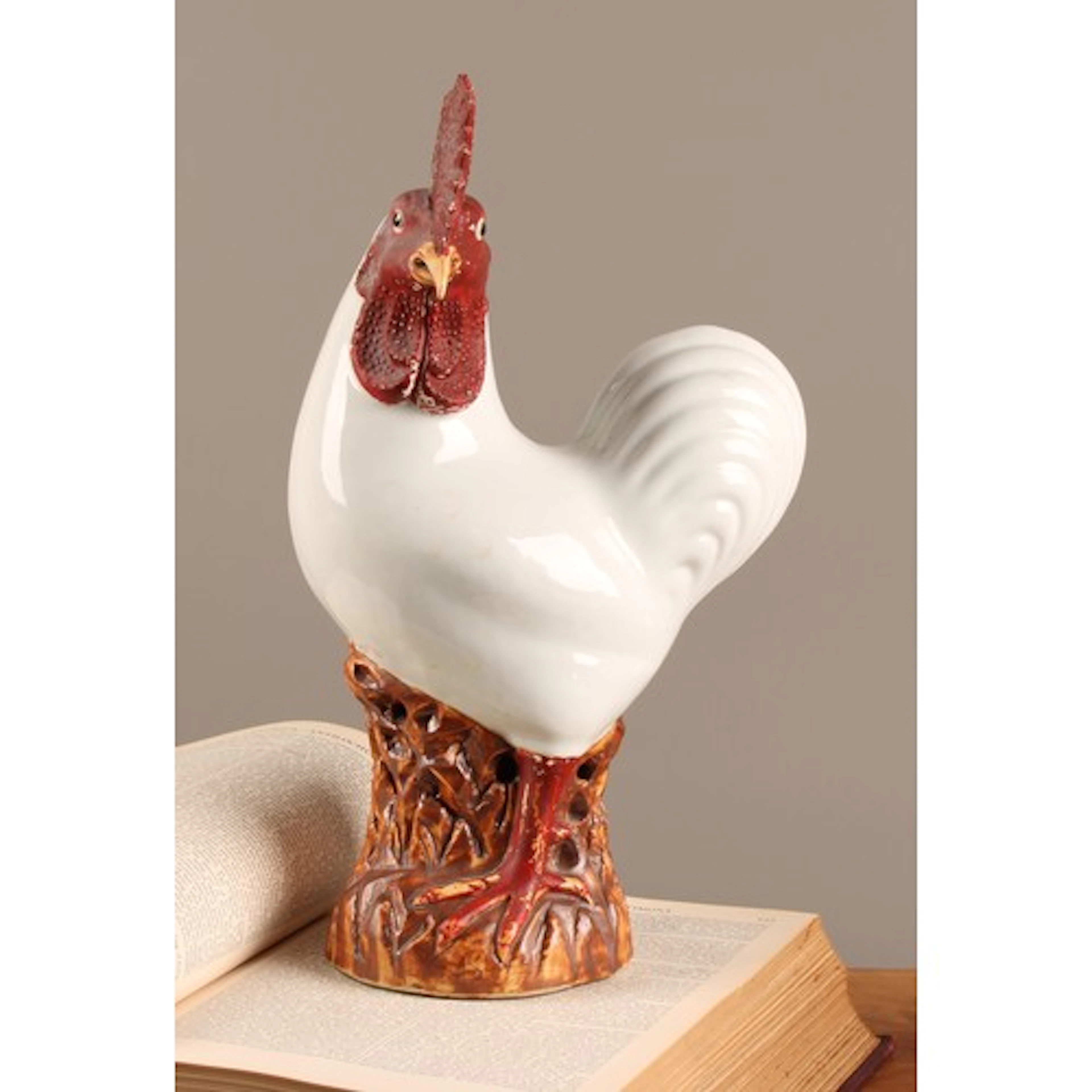 A Chinese porcelain model of a cockeral, 38cm high.