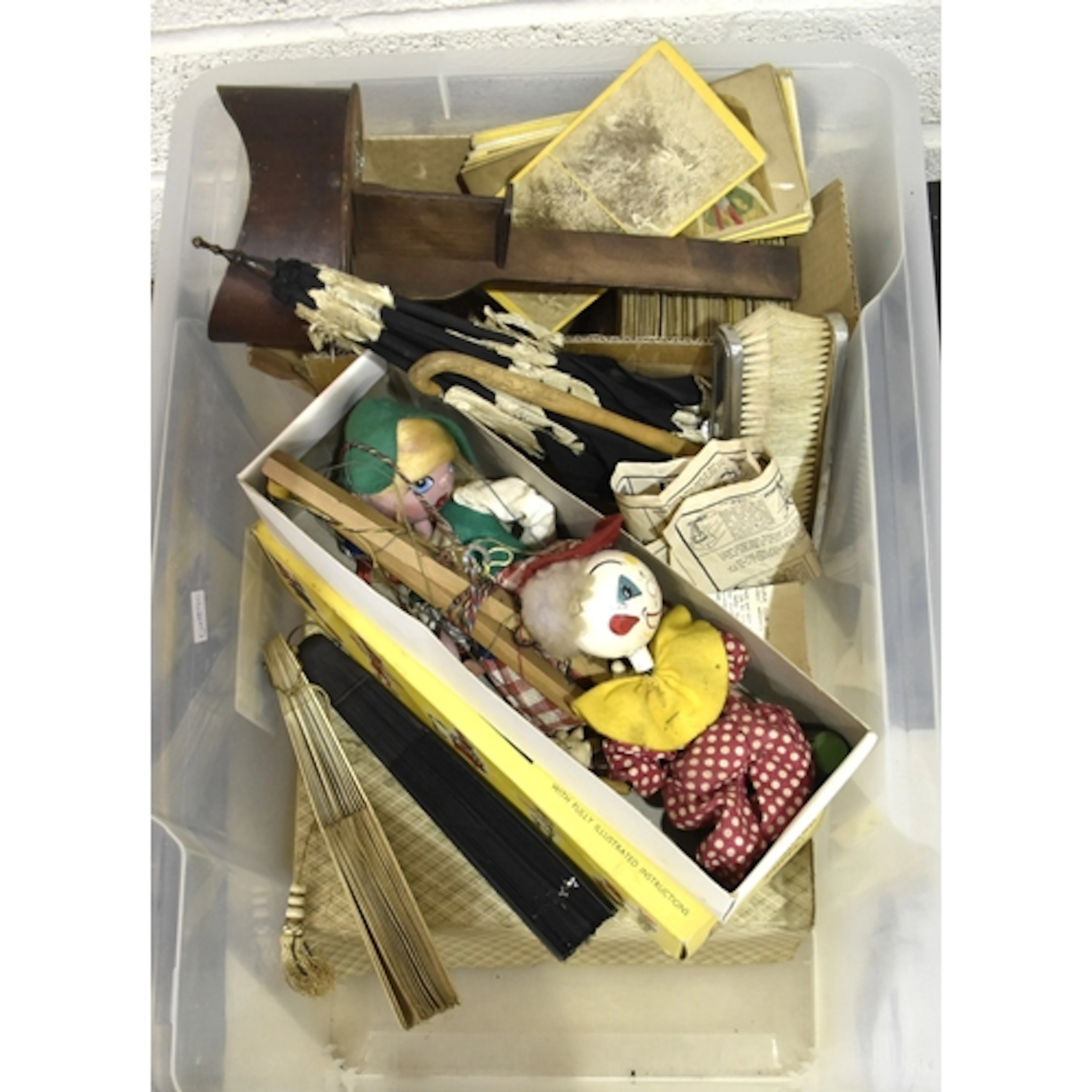 A wooden stereoscope, a collection of stereoscopic slides, t...