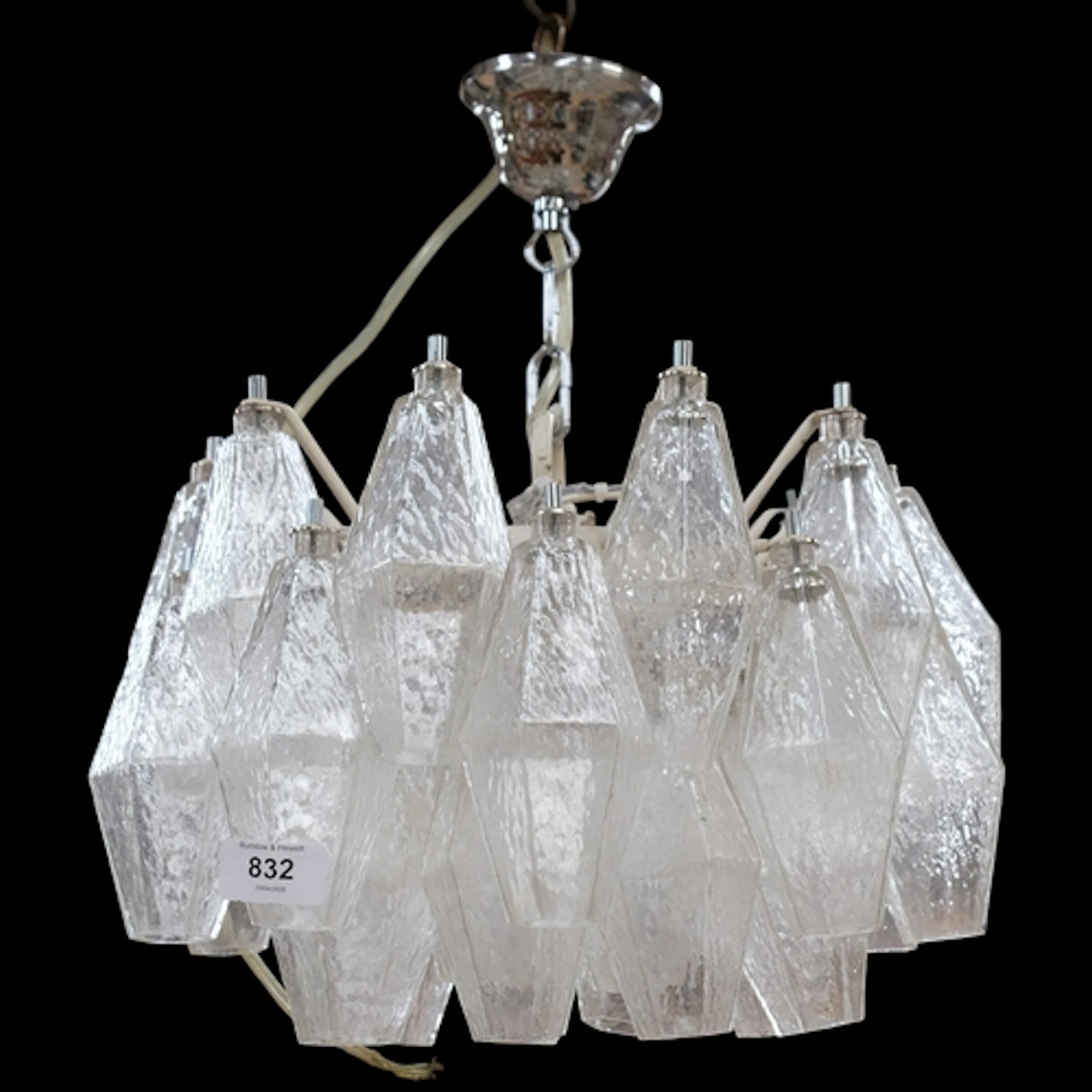 A contemporary Murano style chandelier, with textured geomet...