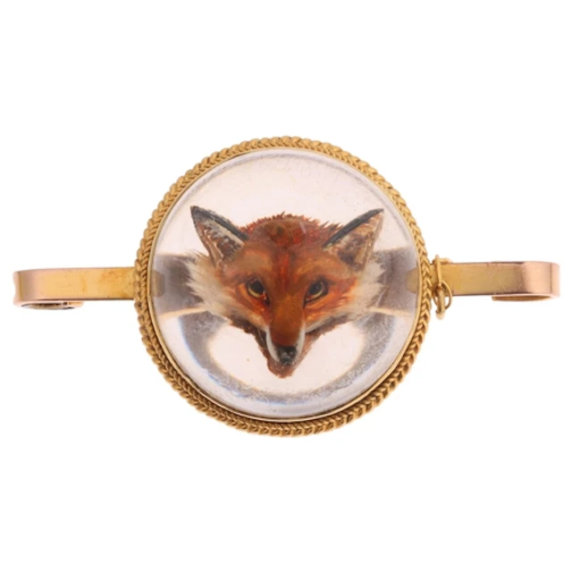 An Antique 9ct gold Essex Crystal 'Fox Mask' bar brooch, the...