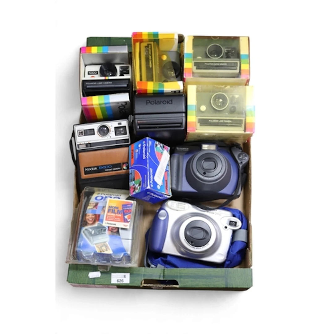 A large collection of Instant Cameras to include Dujifilm In...
