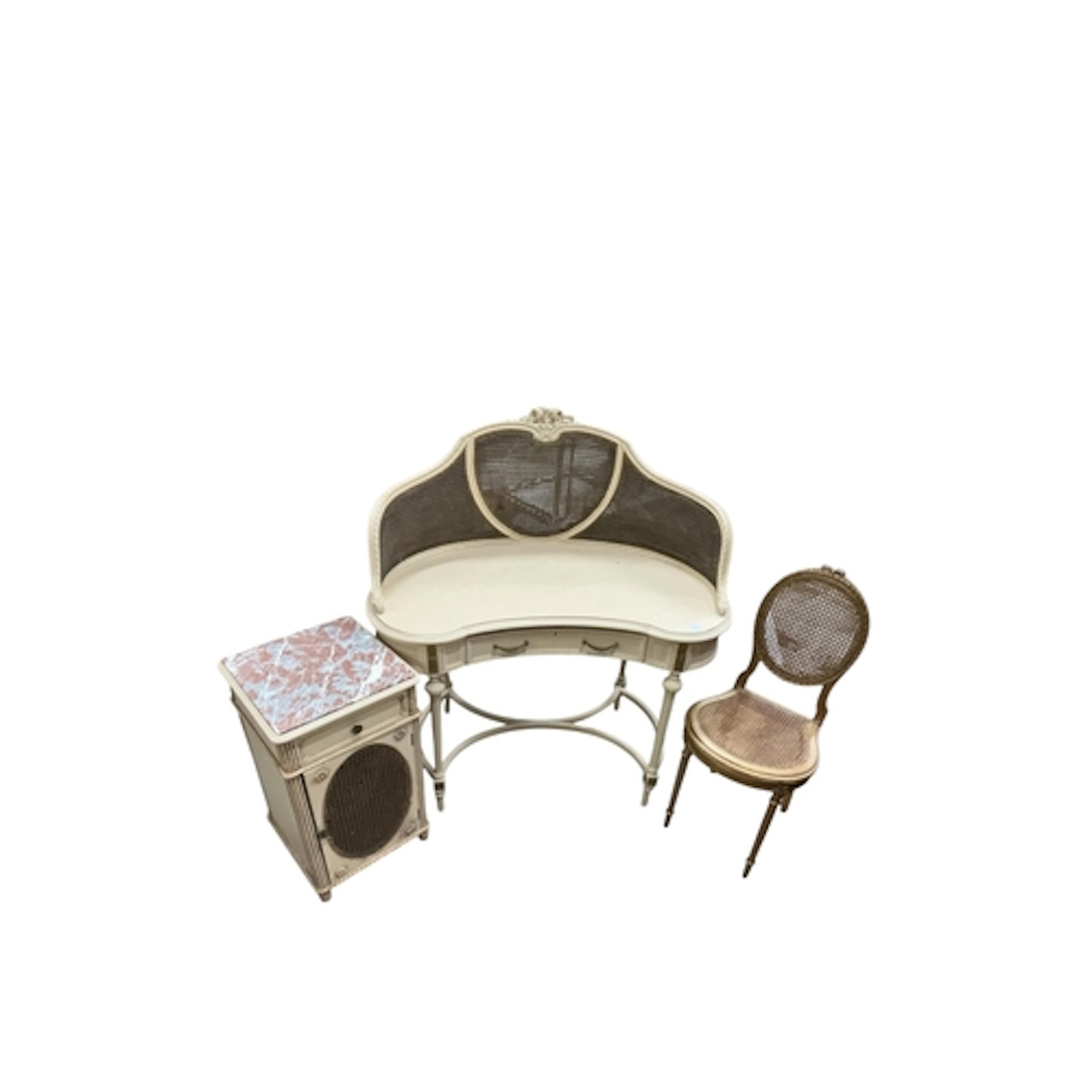 A Louis XVI style cream painted and cane work dressing table...