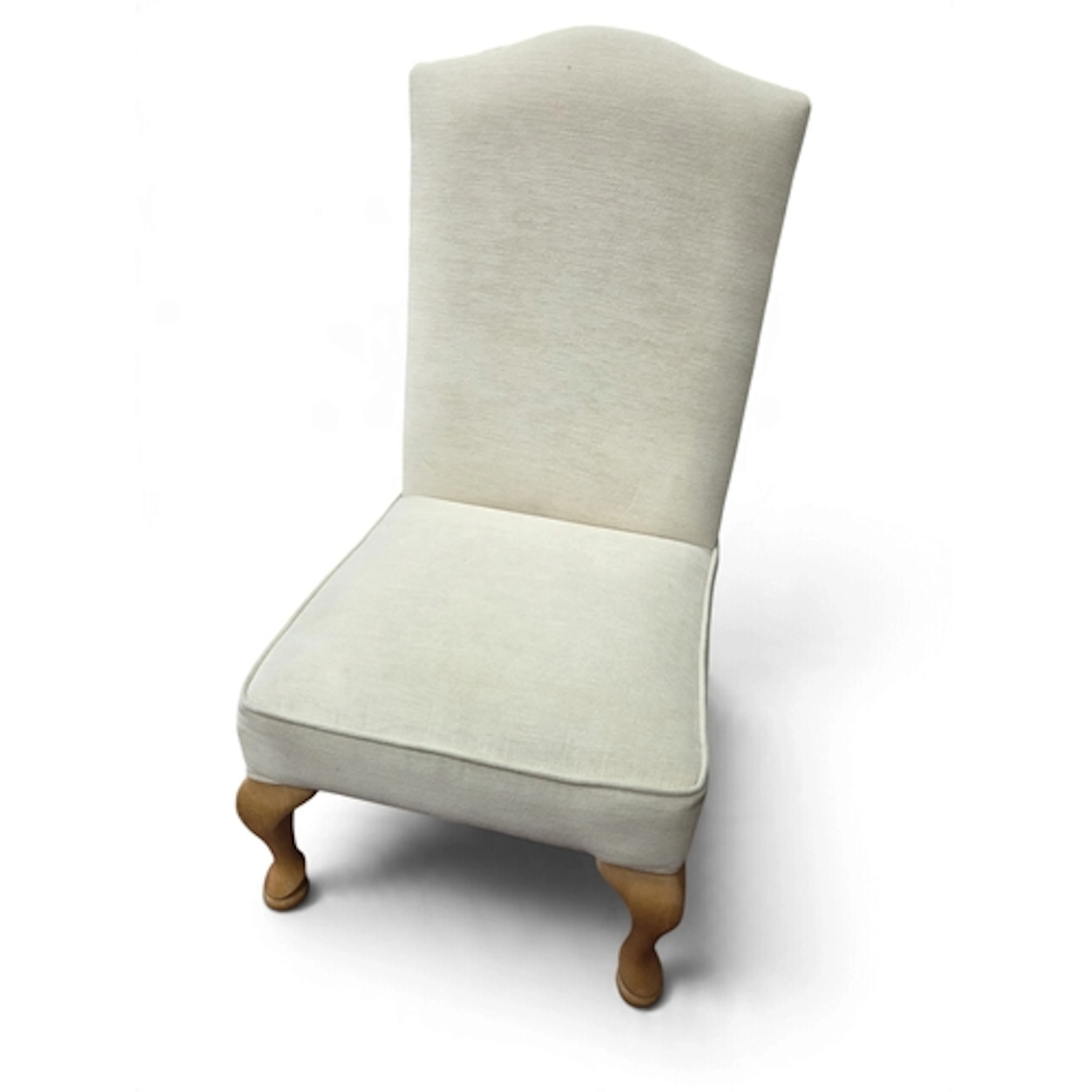 Two wicker Chairs along with an easy chair.