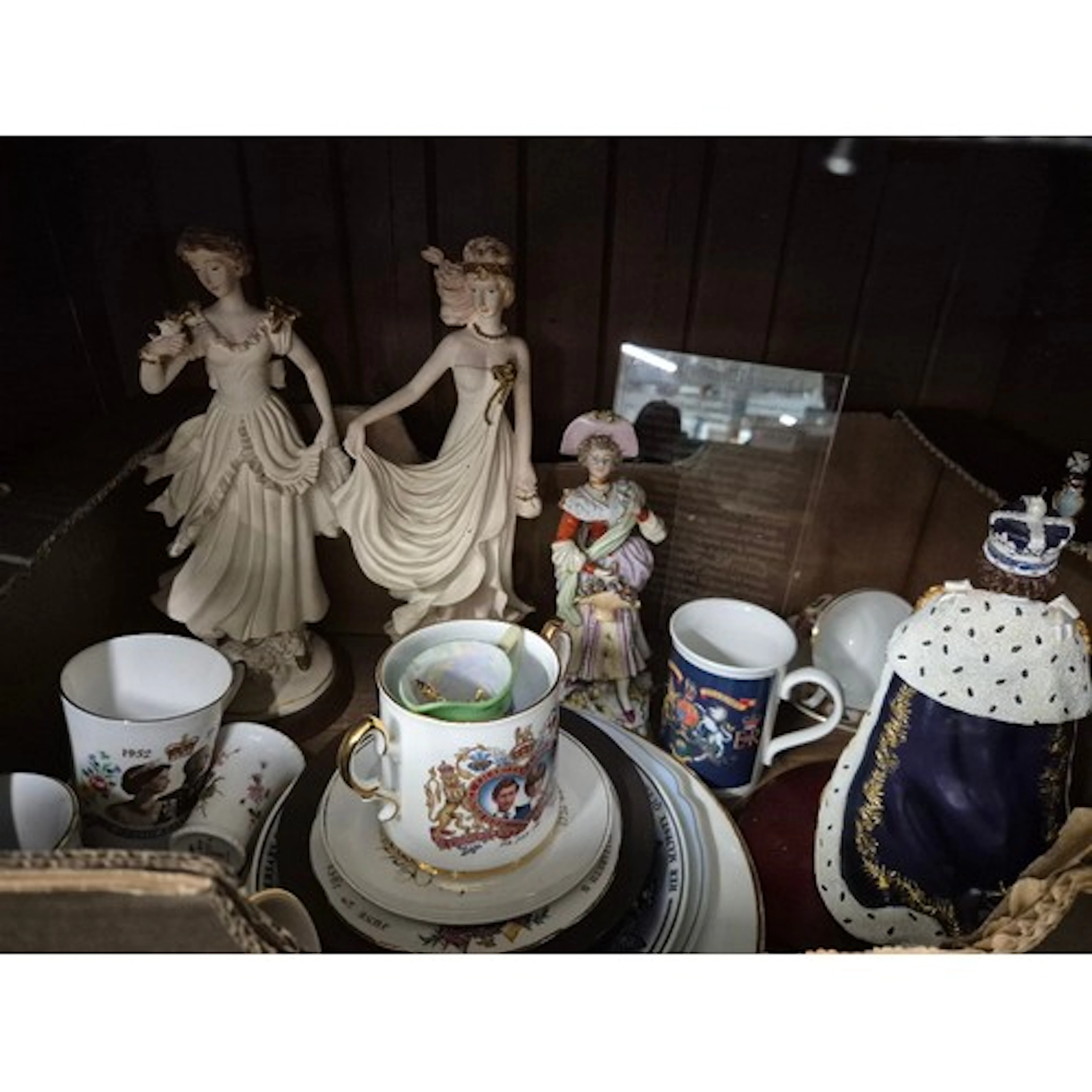 A box of assorted Royal commemorative ware to include a Quee...