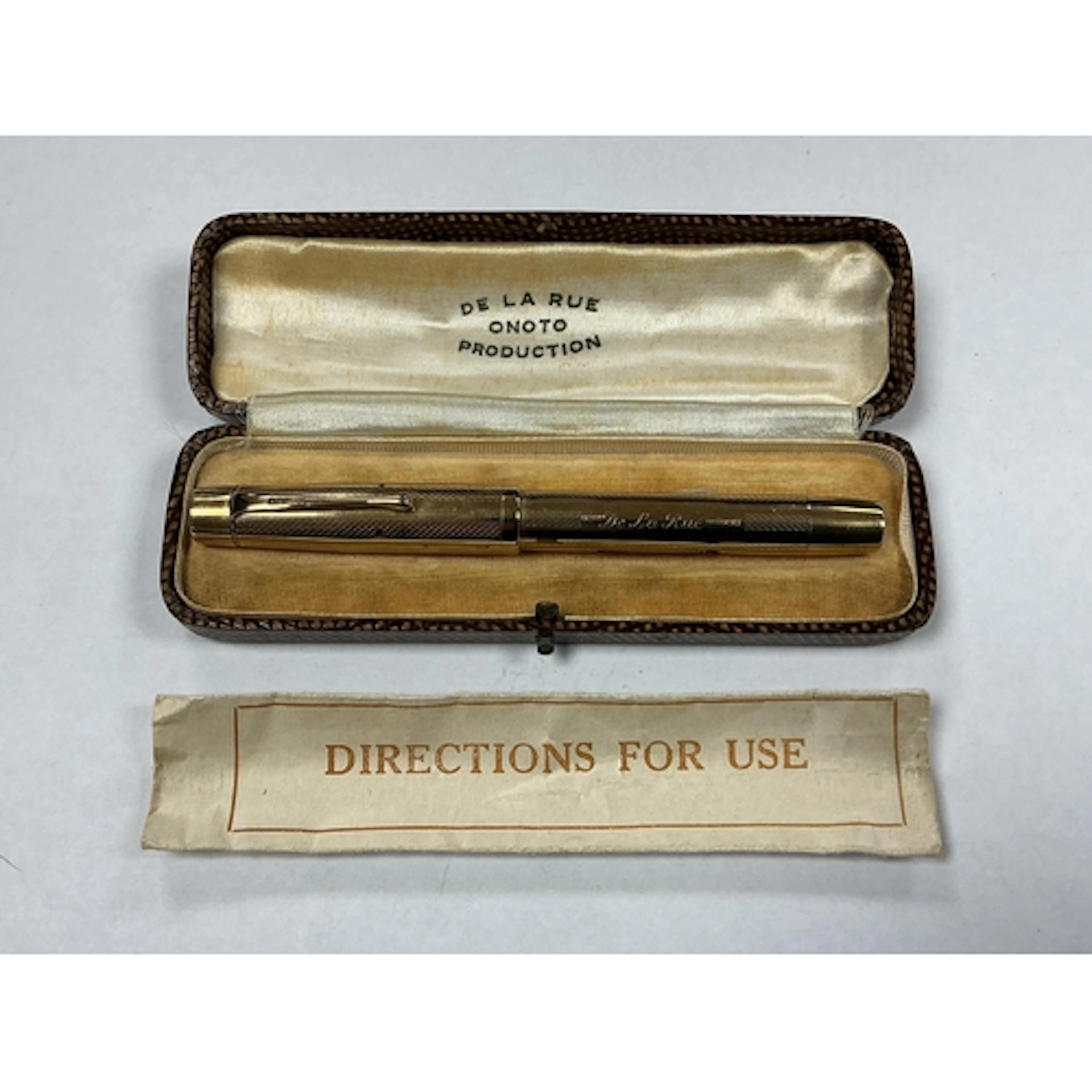 A De La Rue Onoto lever filled pen in 9ct. gold, in original...