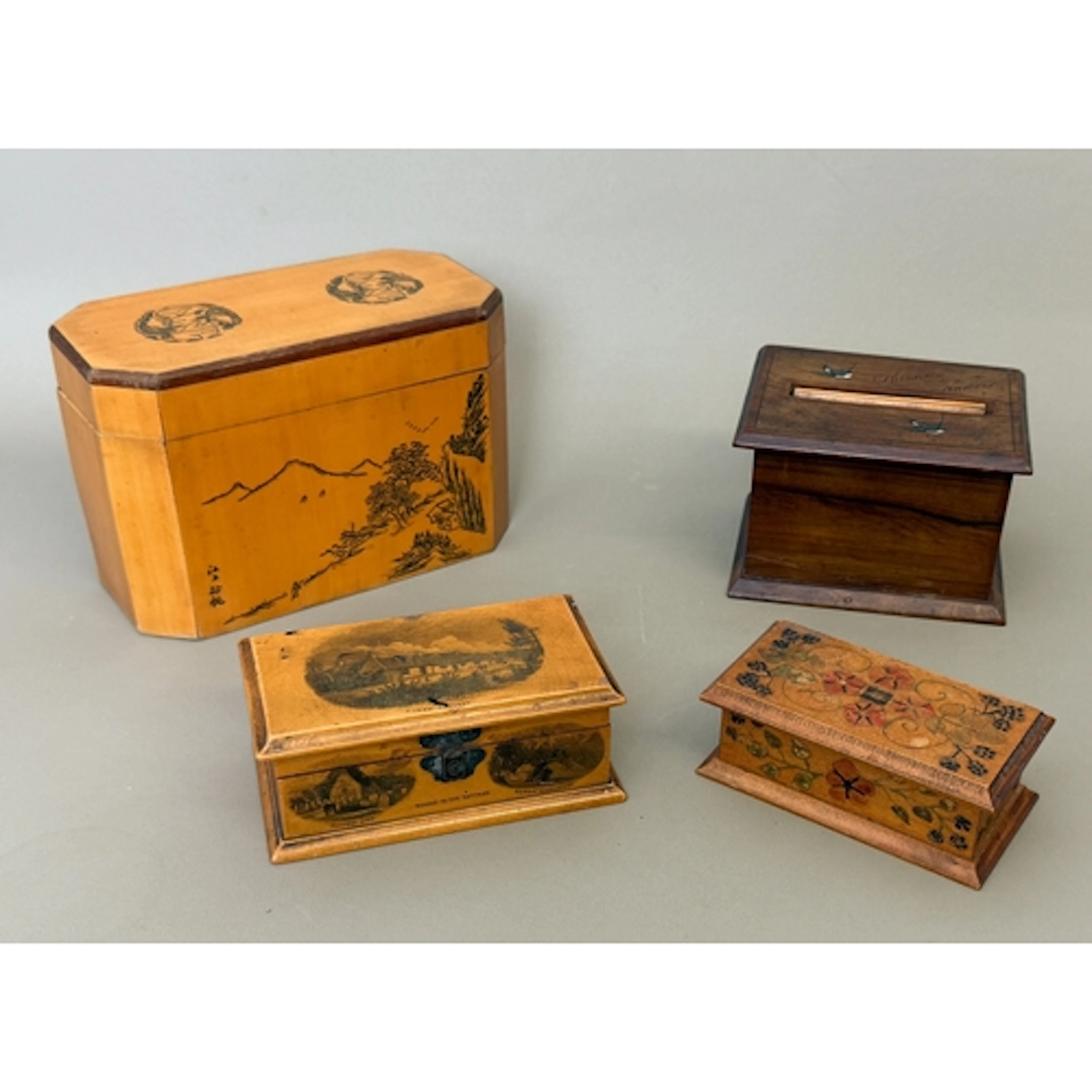 A group of four treen objects - comprising an Edwardian Mauc...