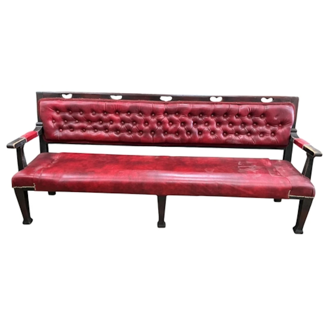 A late Victorian hall or billiards room bench upholstered in...