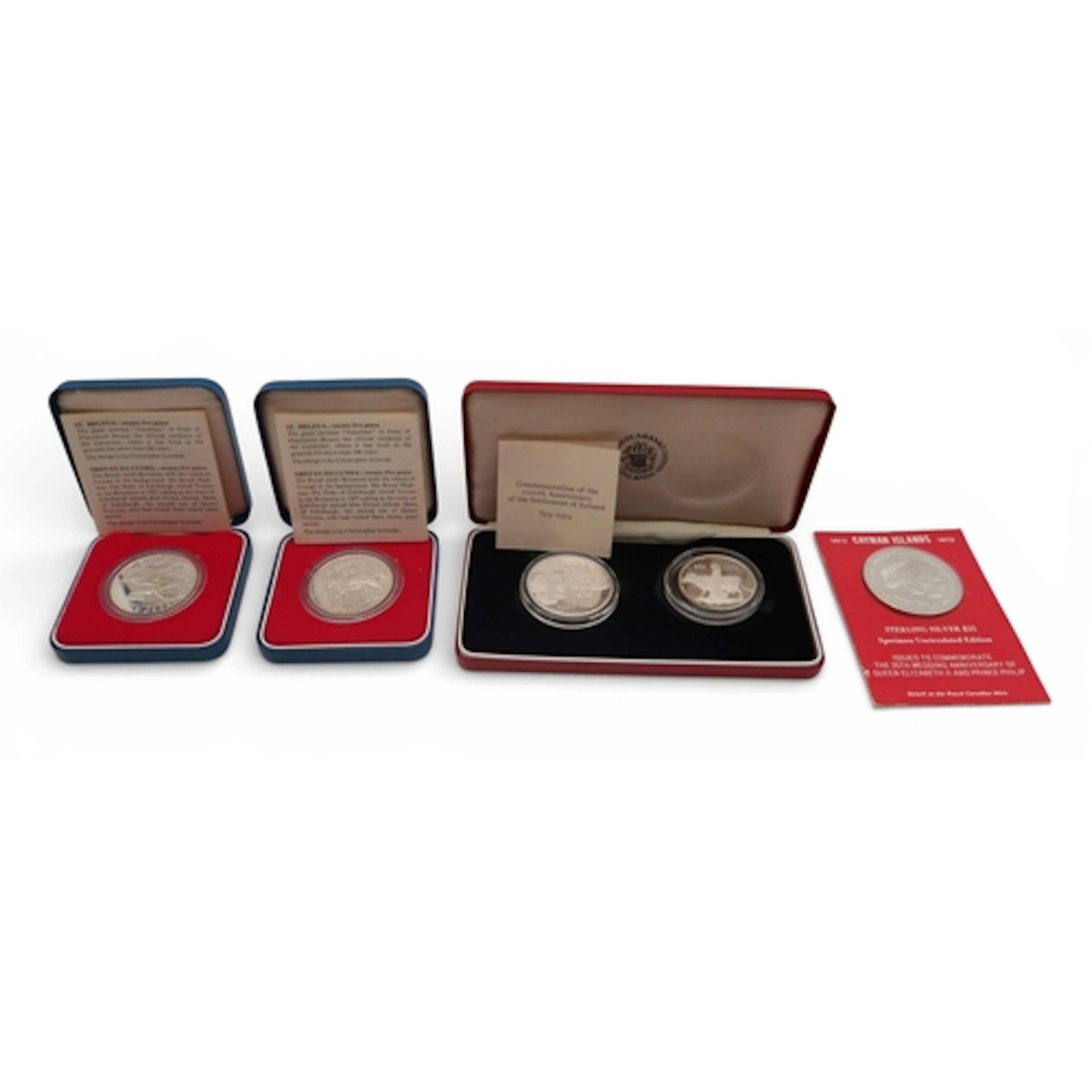 A 1972 Sterling silver $25 Cayman island coin together with ...