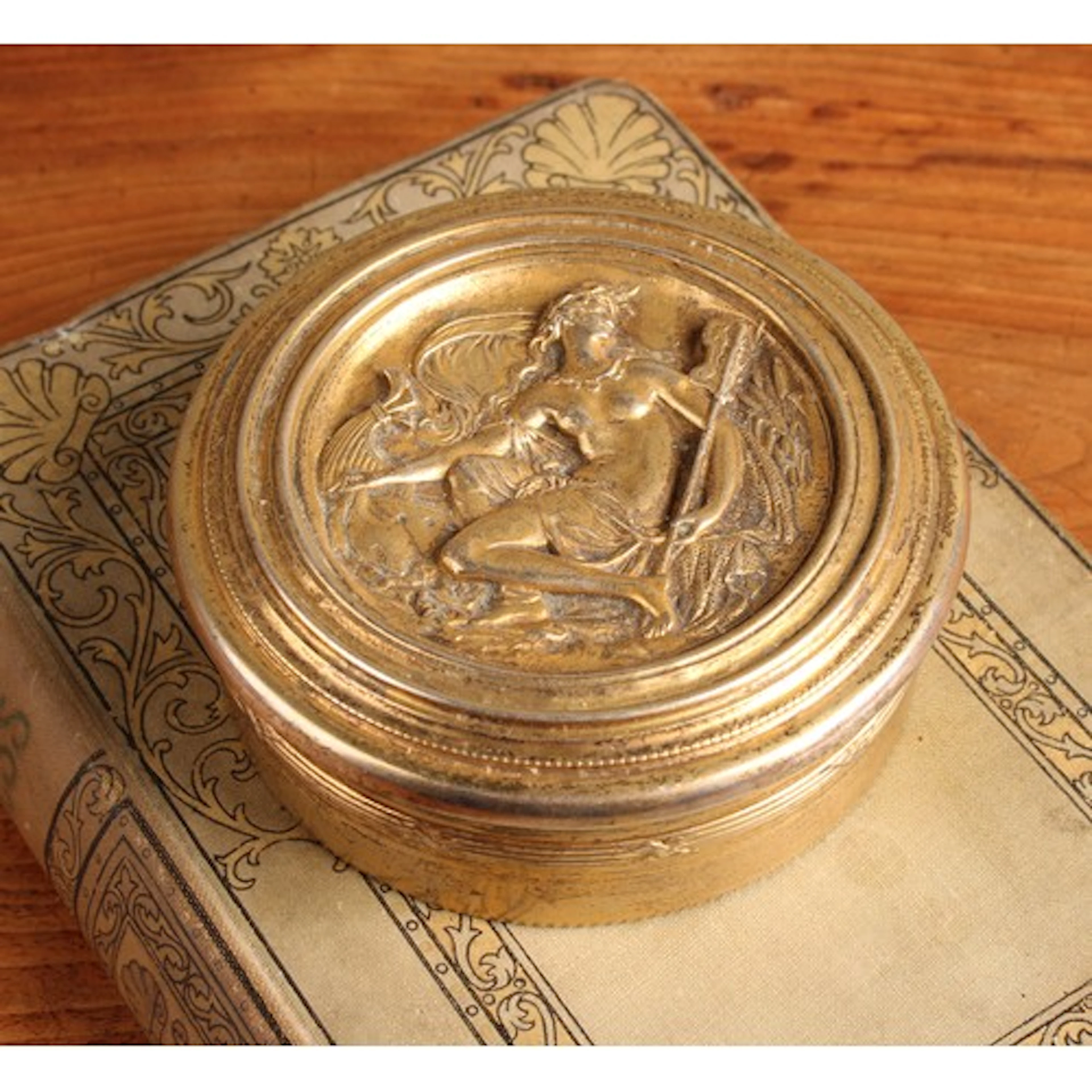 A 19th century Continental silver-gilt coloured metal circul...