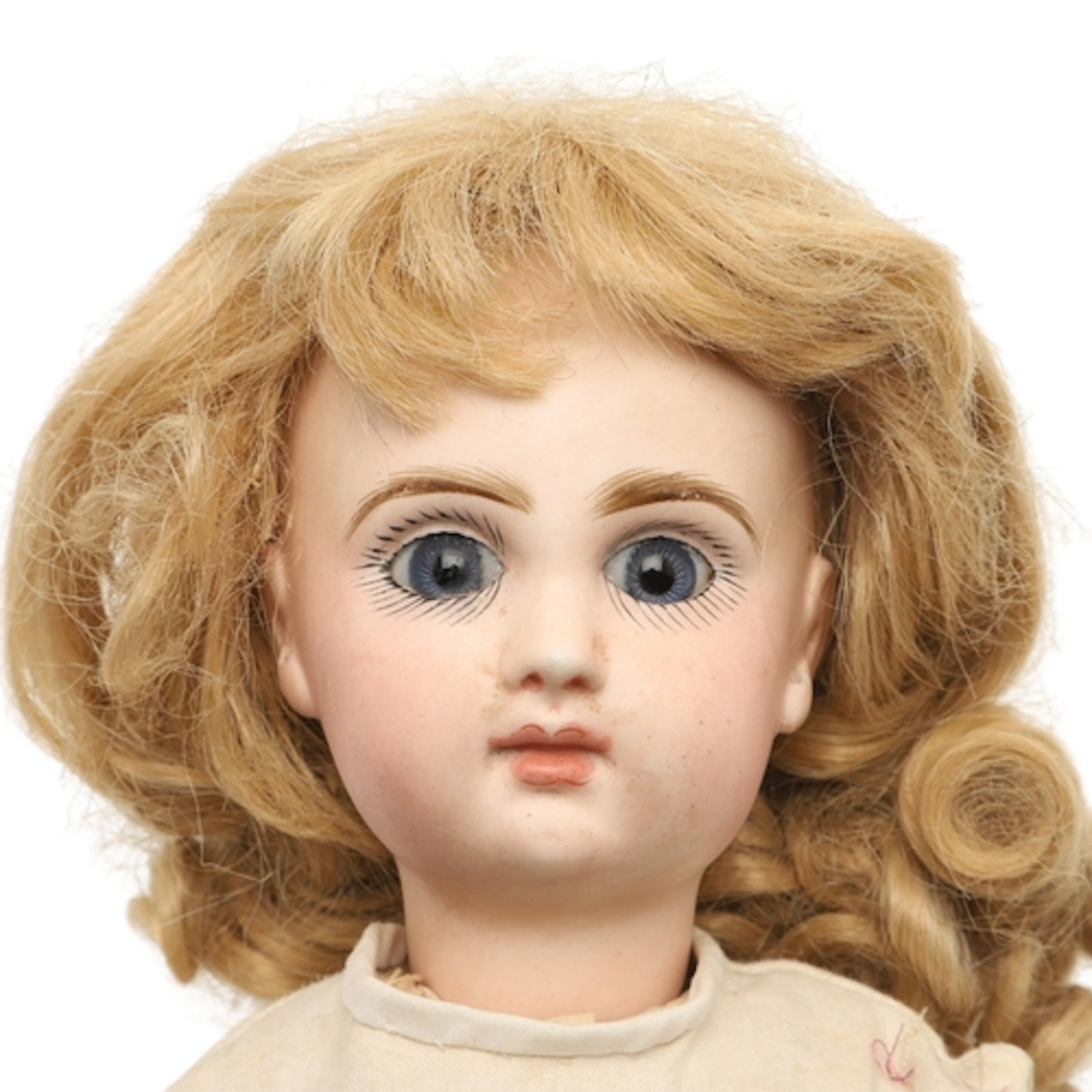 SMALL BISQUE HEAD DOLL. The head possibly by Jumeau, with fi...