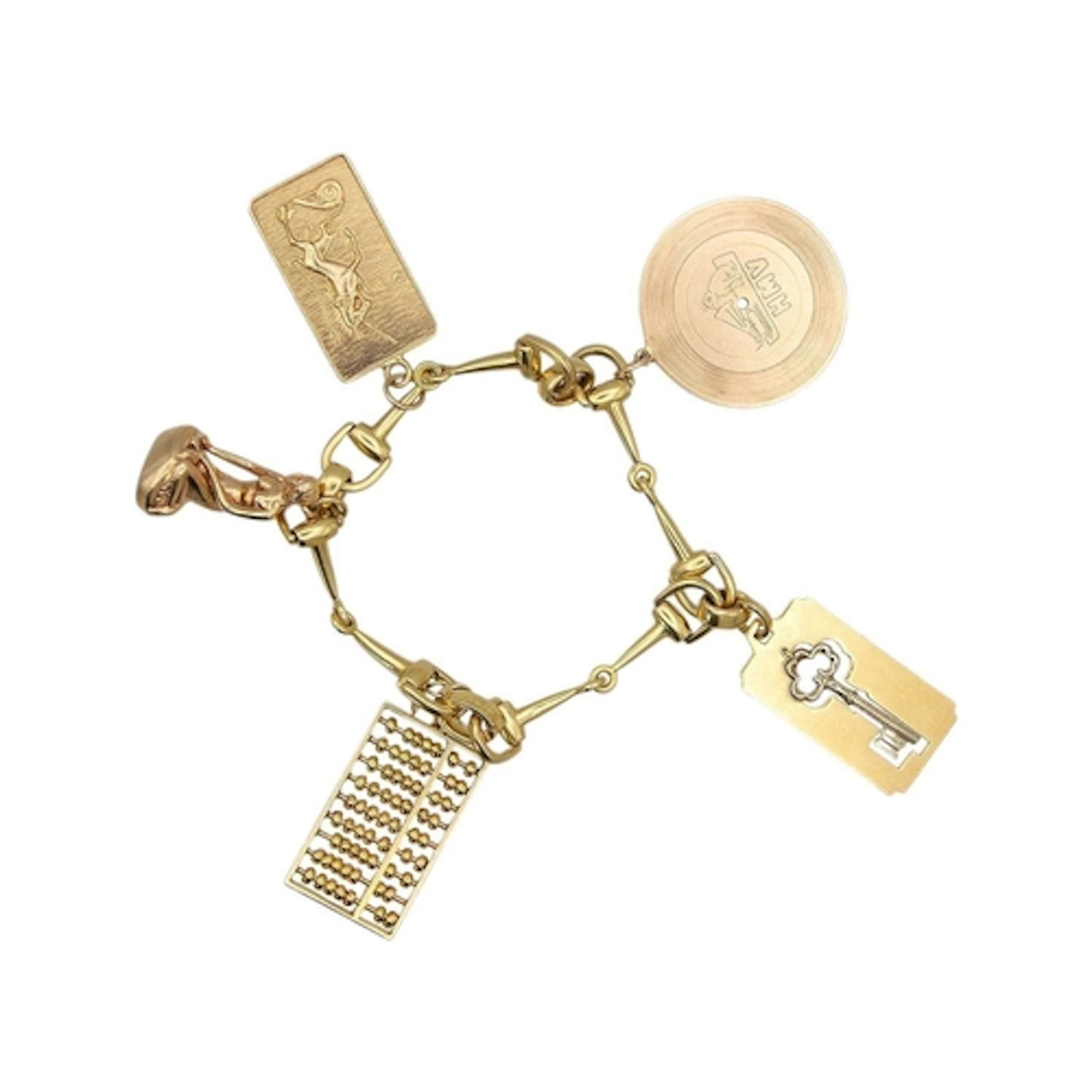An 18k hallmarked gold horse bit bracelet, applied with five...