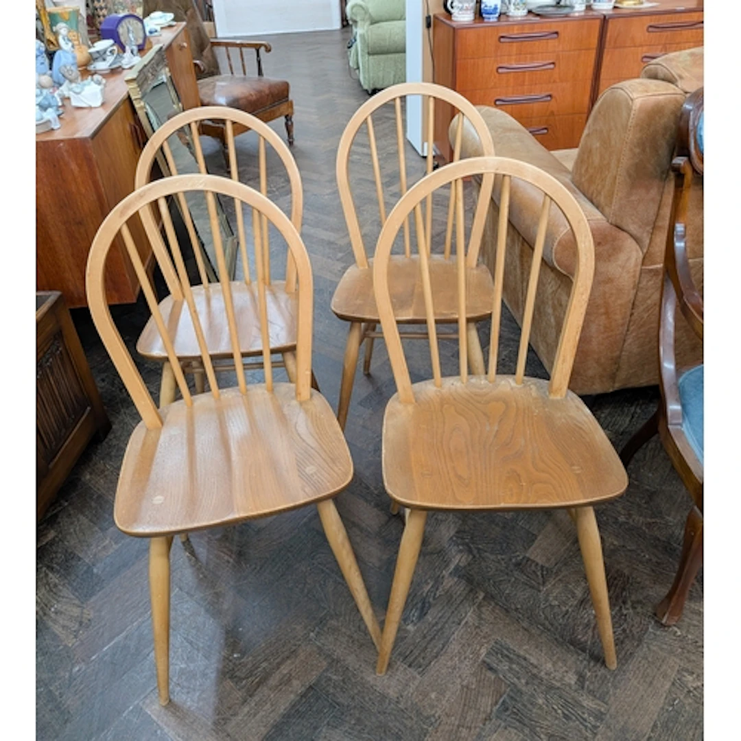 A set of four Ercol Windsor hoop back dining chairs