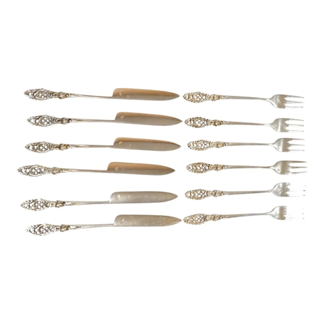 A set of six continental white metal sweetmeat forks, all st...