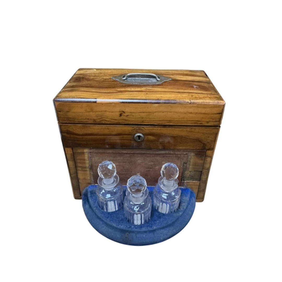 A Victorian walnut jewellery casket combined with scent bott...