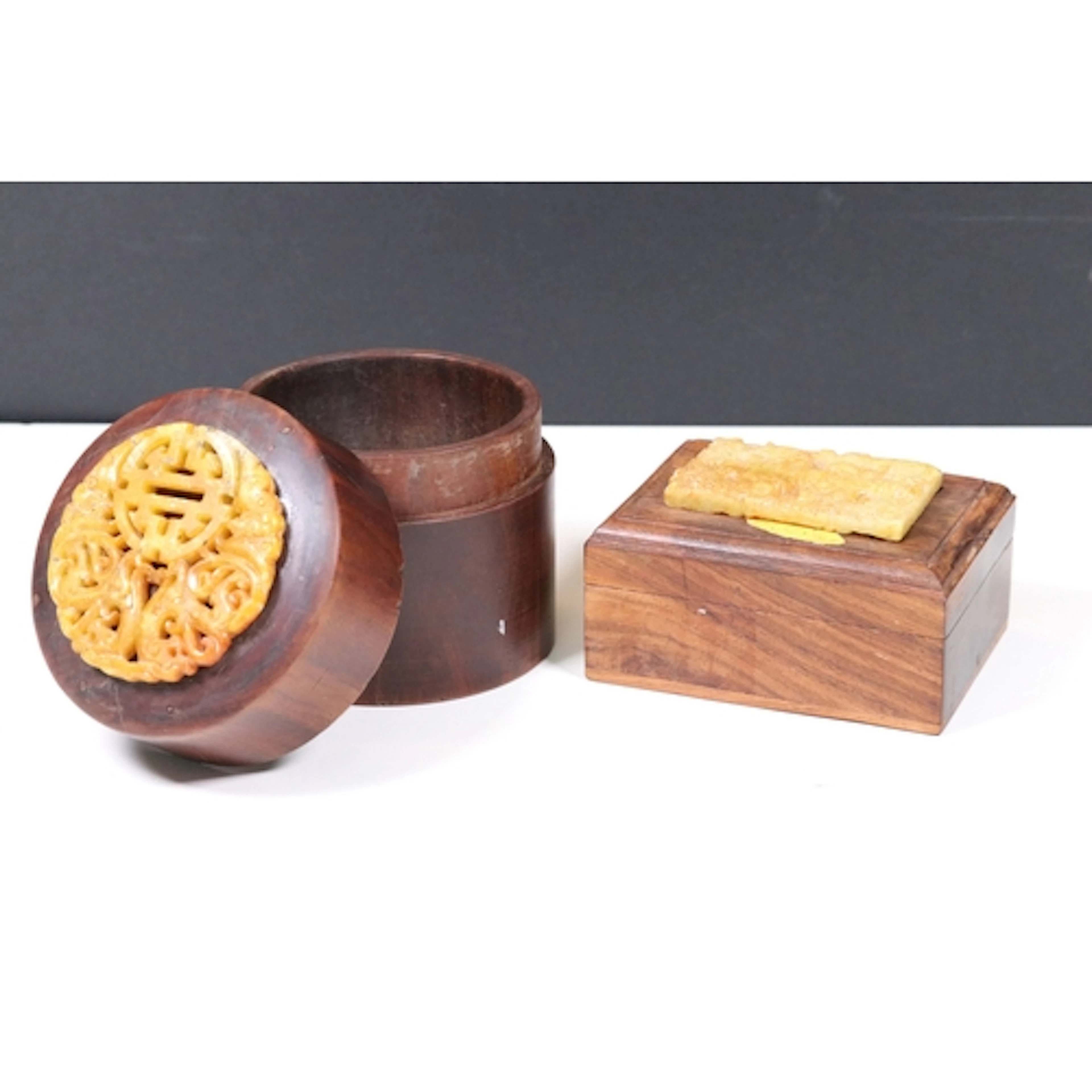 Two 20th century carved jade and hardwood boxes, comprising ...