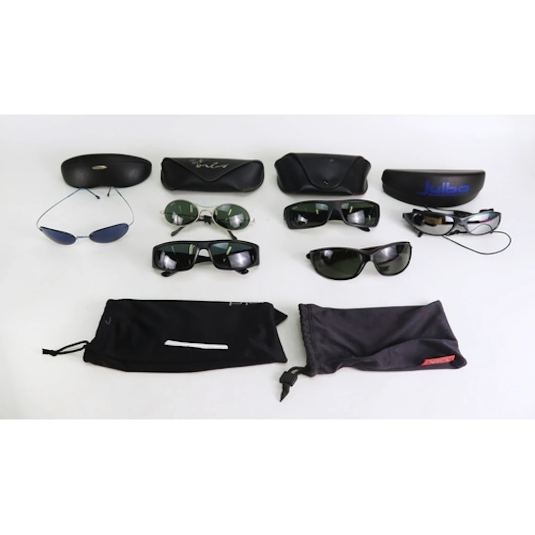 Two pairs of Ray Ban sunglasses and others, with solid cases...