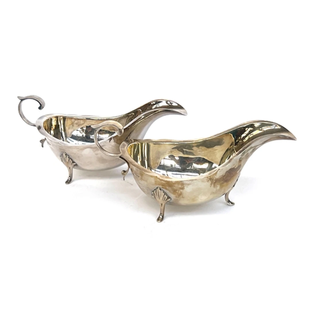 A pair of silver sauce boats by Cooper Brothers & Sons Ltd, ...