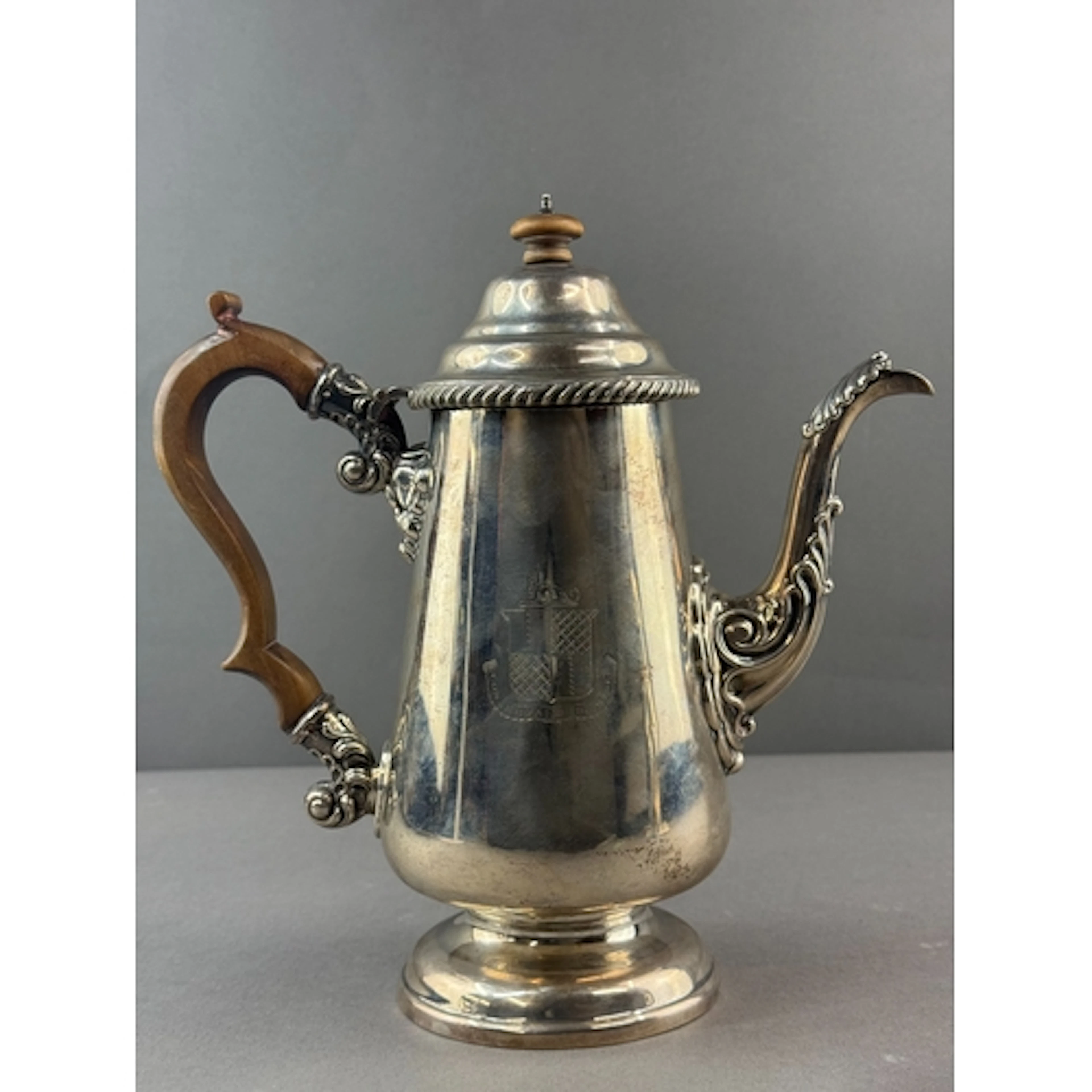 Silver: a George IV coffee pot of tapering form, the handle ...
