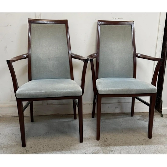 A pair of G-Plan open arm chairs upholstered in a pale blue ...