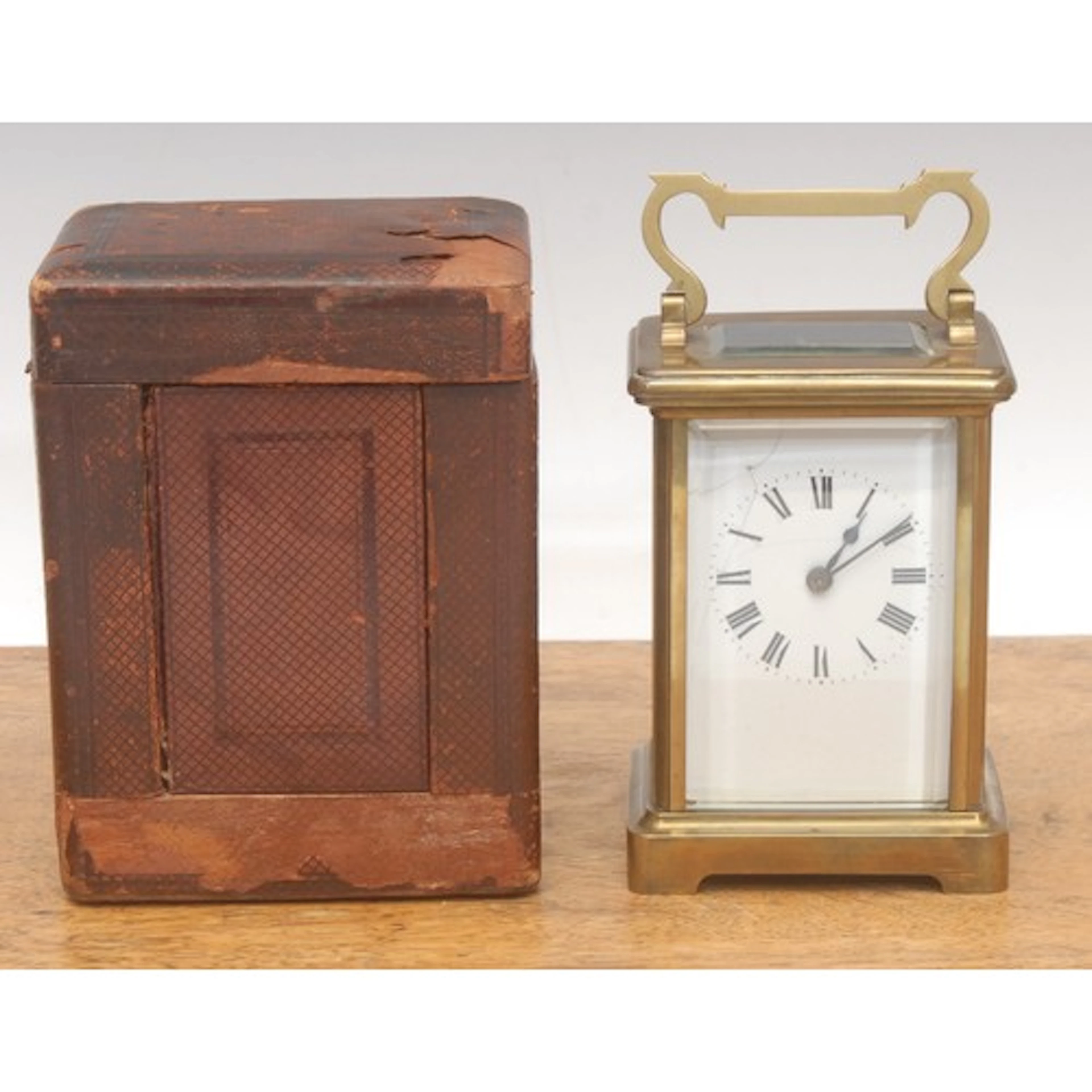A 19th century brass carriage clock, enamel dial, Roman nume...