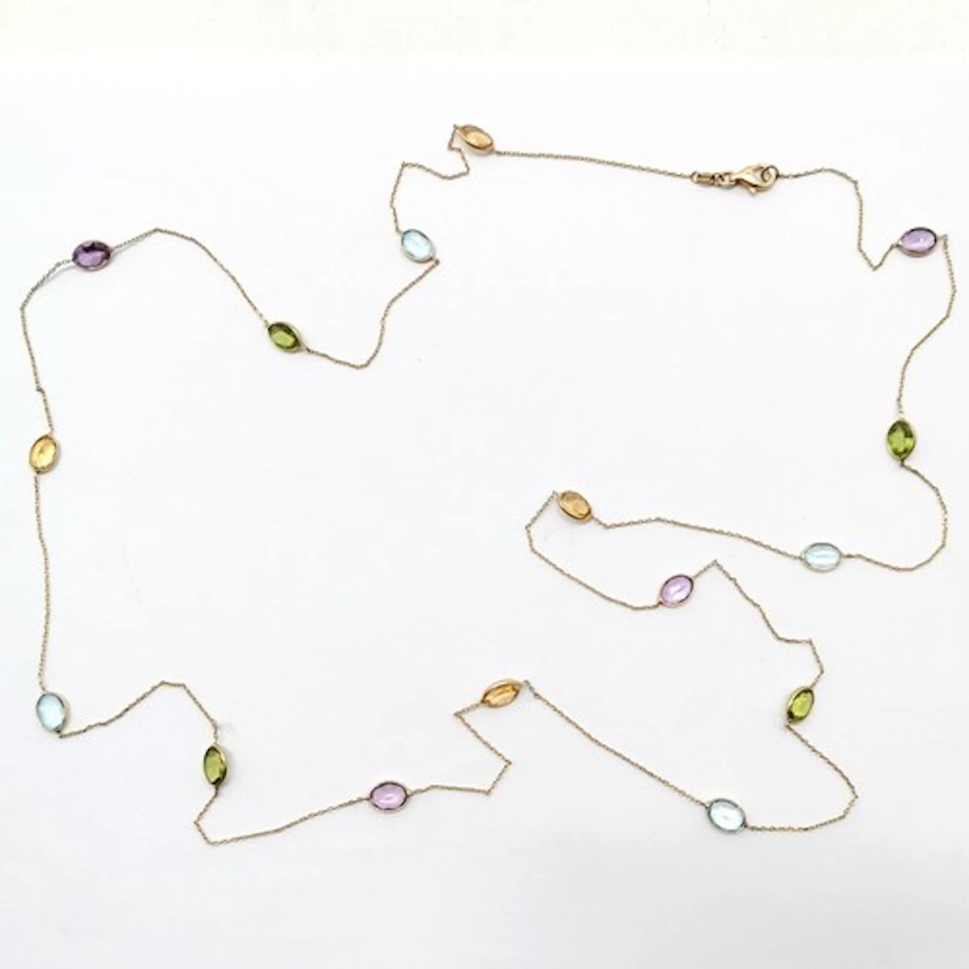 9ct marked gold long necklace with multi coloured stone deta...