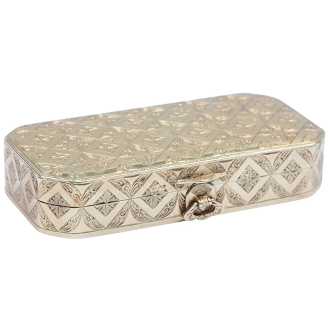 A gold vanity case, Austria, mid 20th century, of cut-corner...