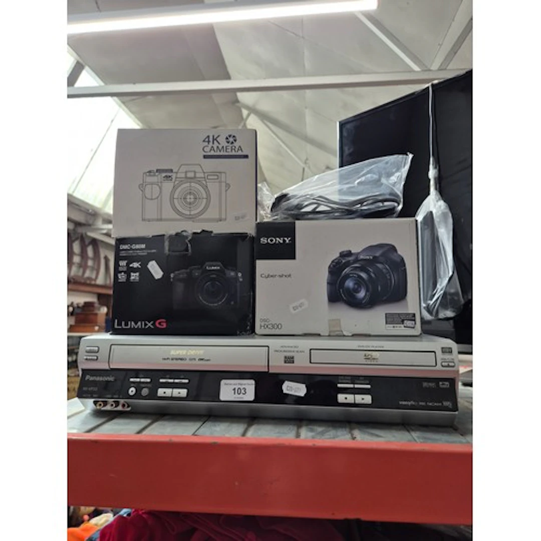 A group of three cameras (Sony Cyber-shot DSC-HX300, Panason...
