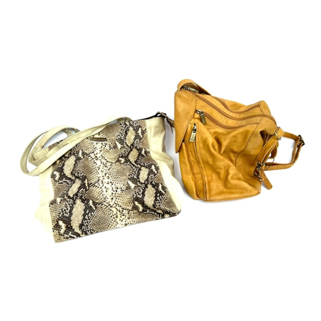 A Russell & Bromley leather bag; together with a Visconti ta...