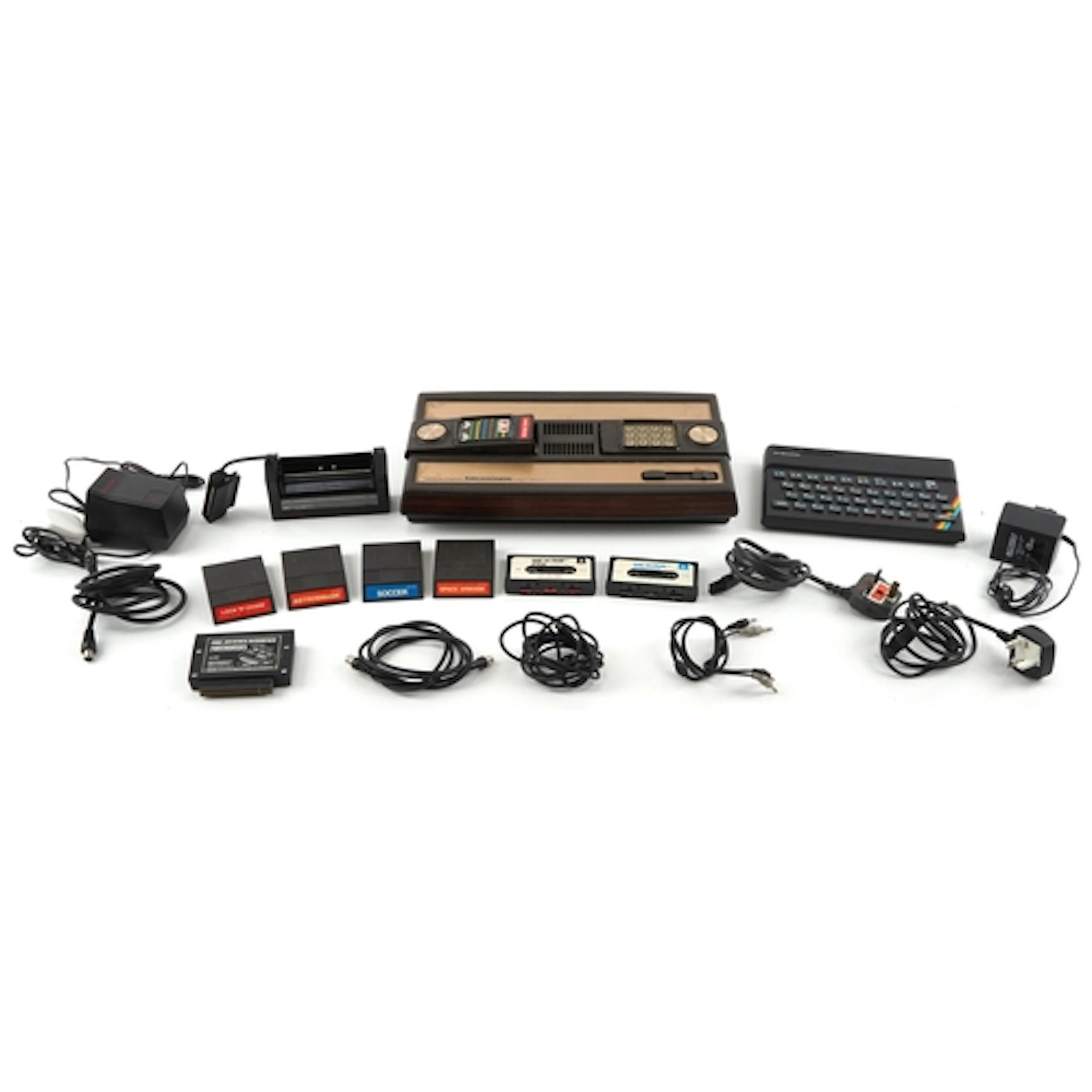 Mattel Electronics Intellivision console with a selection of...