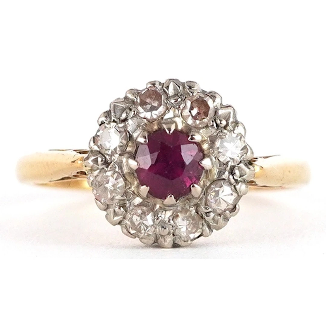 18ct gold ruby and diamond cluster ring, size J, 2.6g.