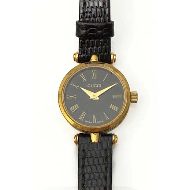 A vintage 1980s Gucci ladies quartz wrist watch - the black ...
