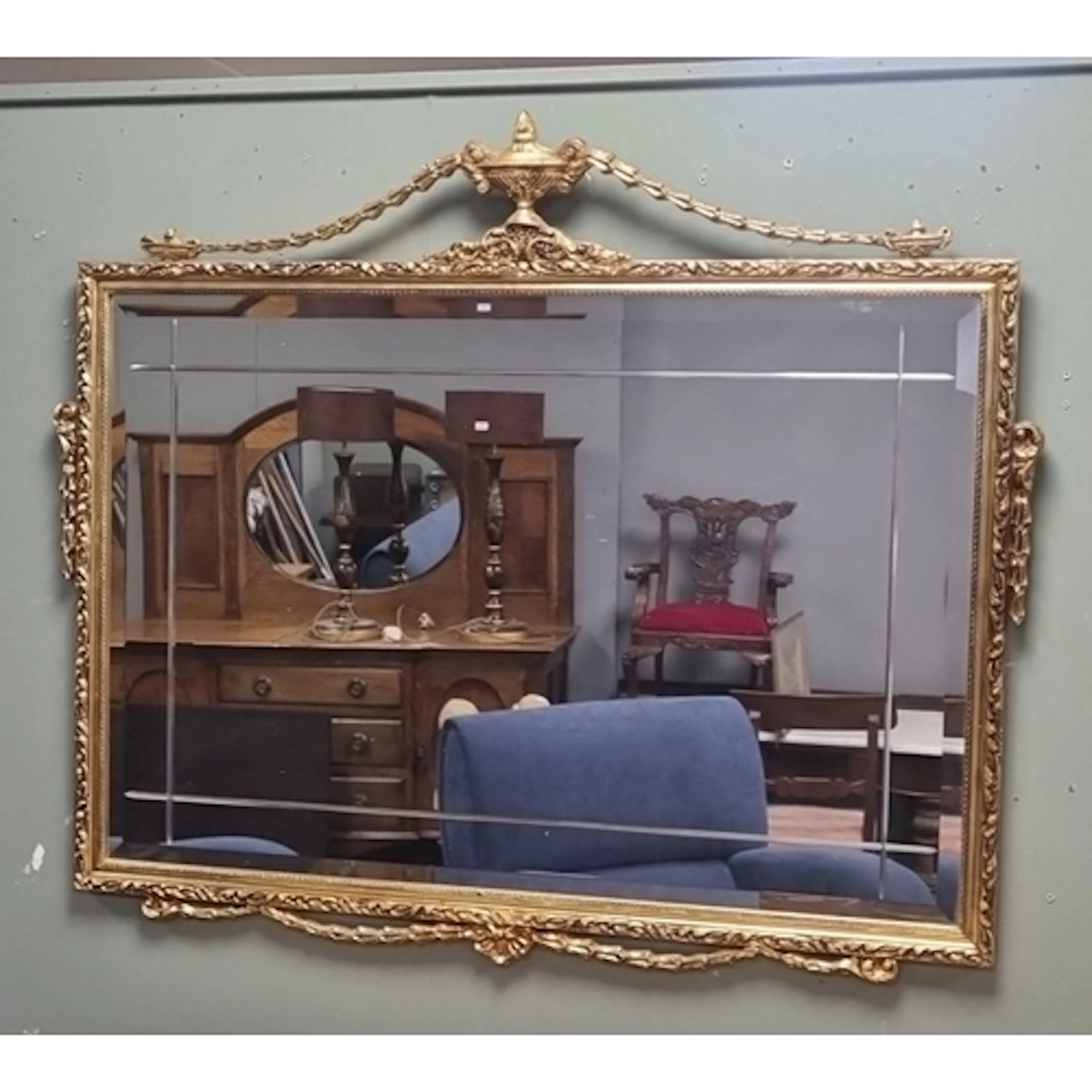 Giltwood Wall Mirror with Urn Crest H: 82 cm x W: 97 cm.