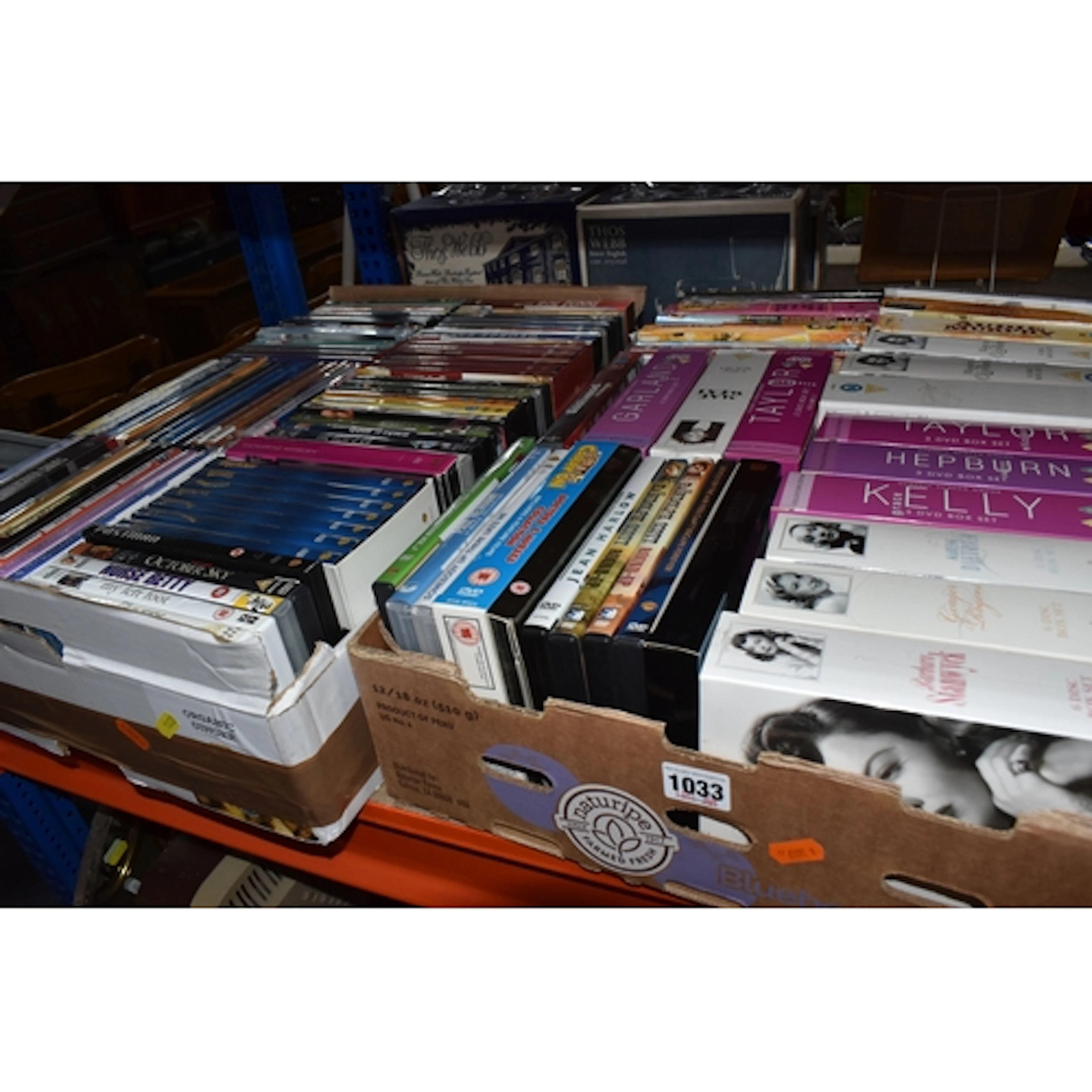 TWO BOXES OF DVDS, approximately eighty DVDs and DVD sets, t...