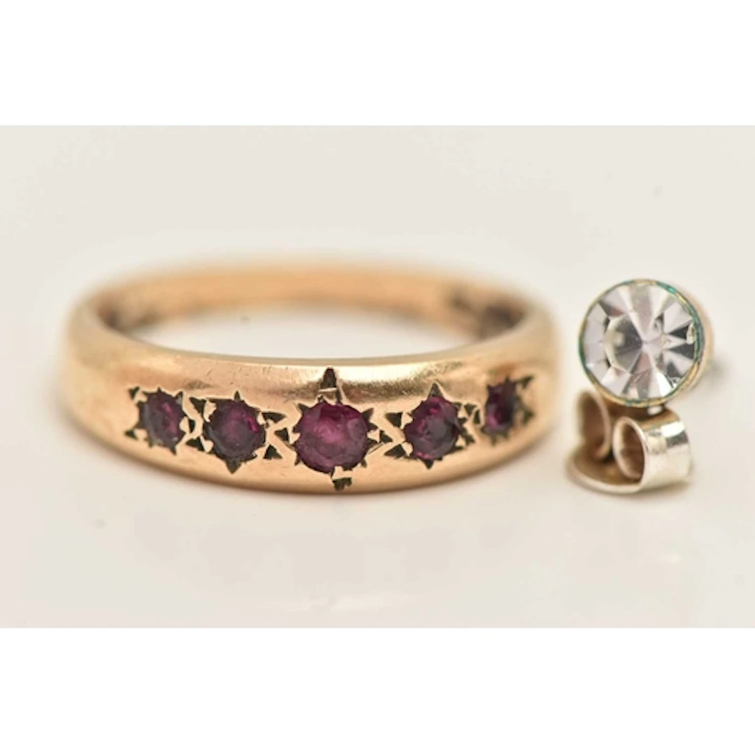 A 9CT GOLD RED GEM FIVE STONE RING AND A SINGLE ODD EARRING,...