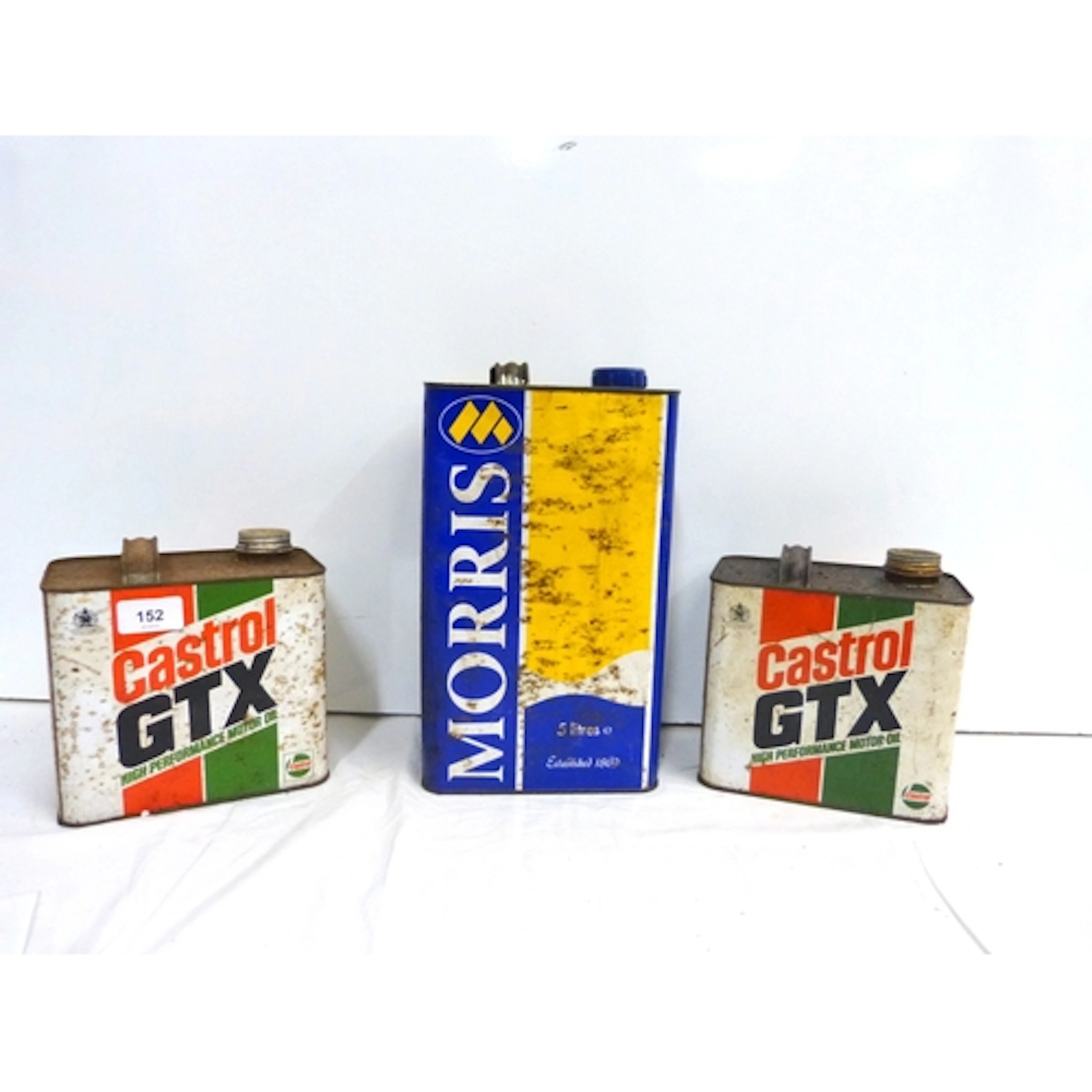 Pair of vintage Castrol GTX oil cans and vintage Morris oil ...