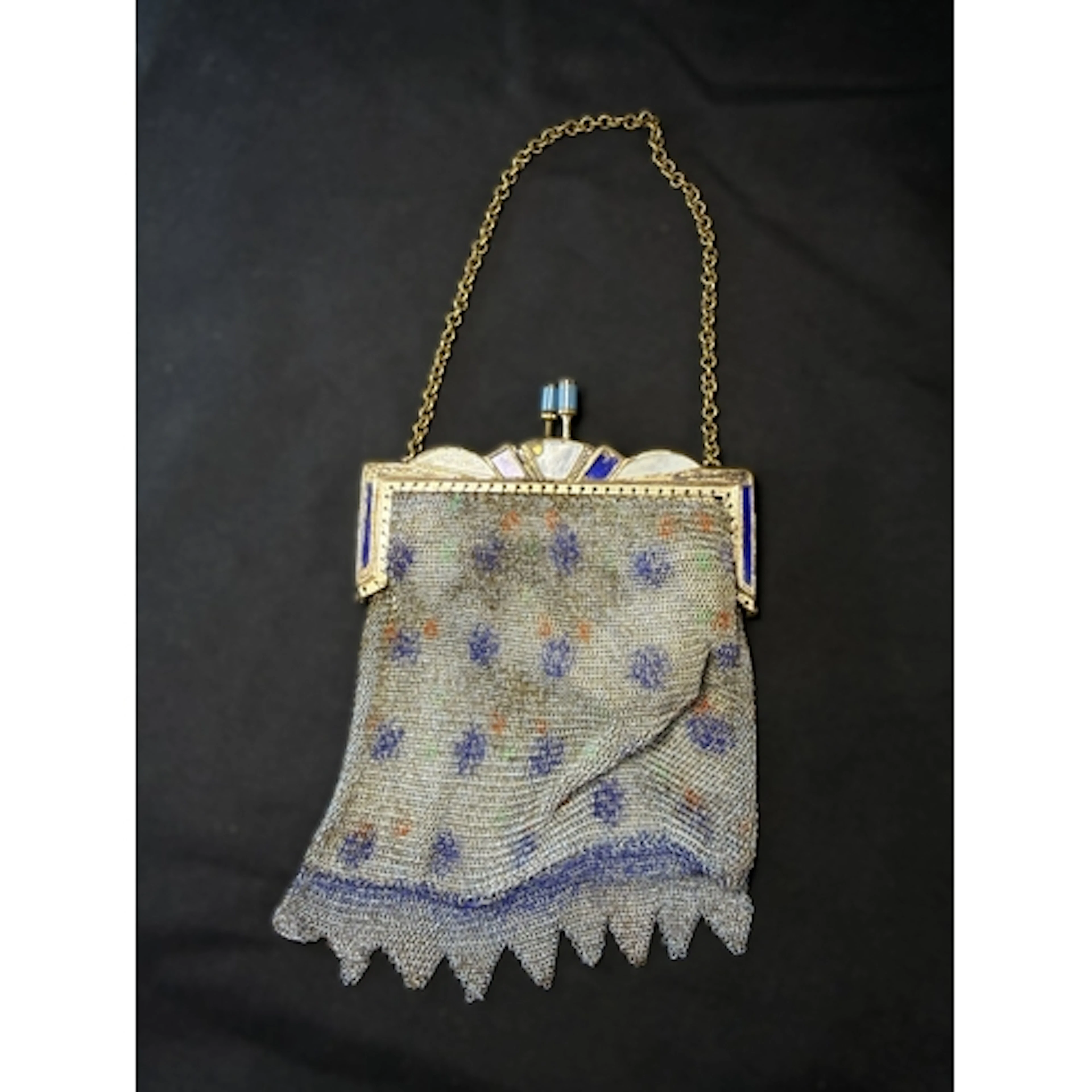 An art deco silvered metal mesh evening bag with coloured en...