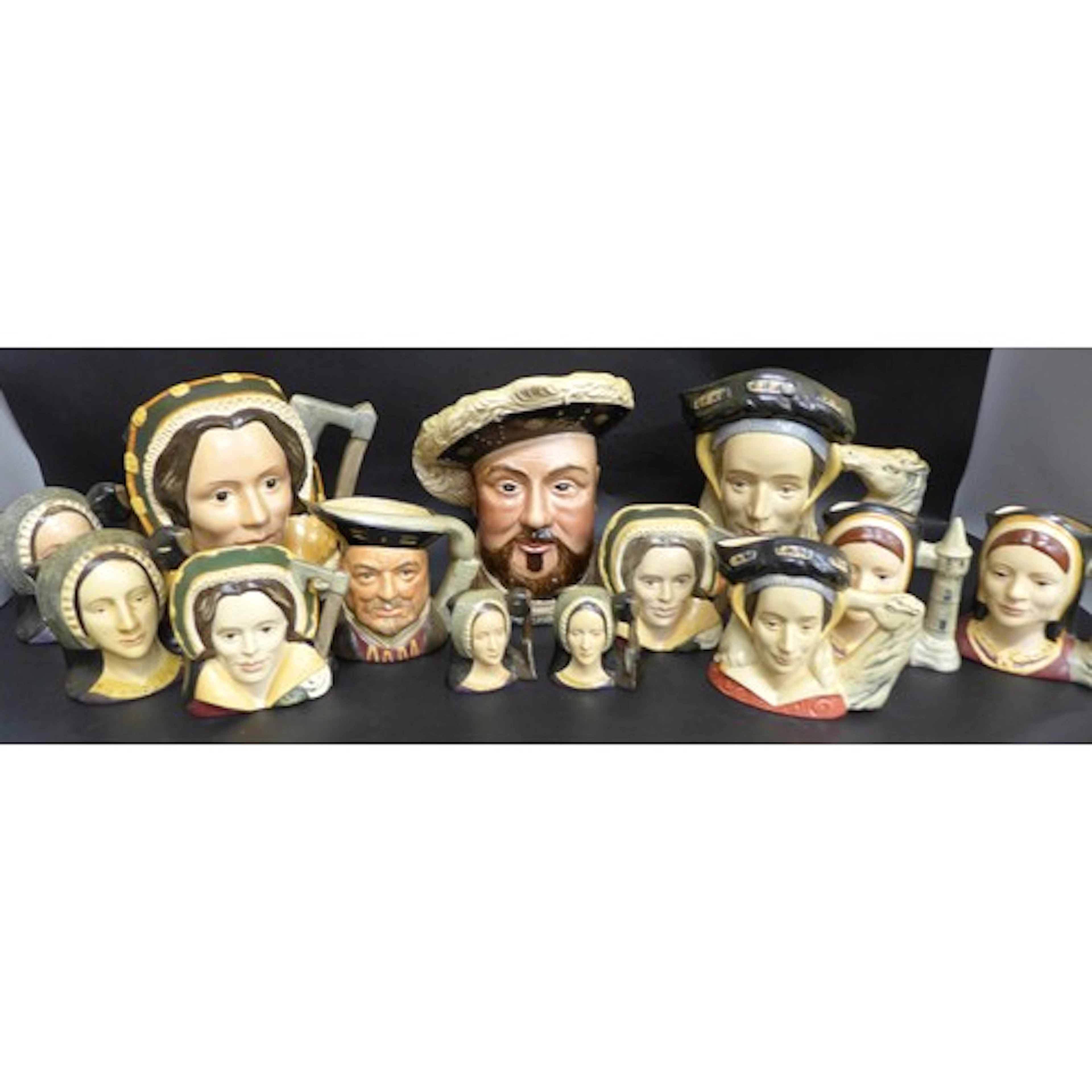 Three large Royal Doulton character jugs including Henry VII...