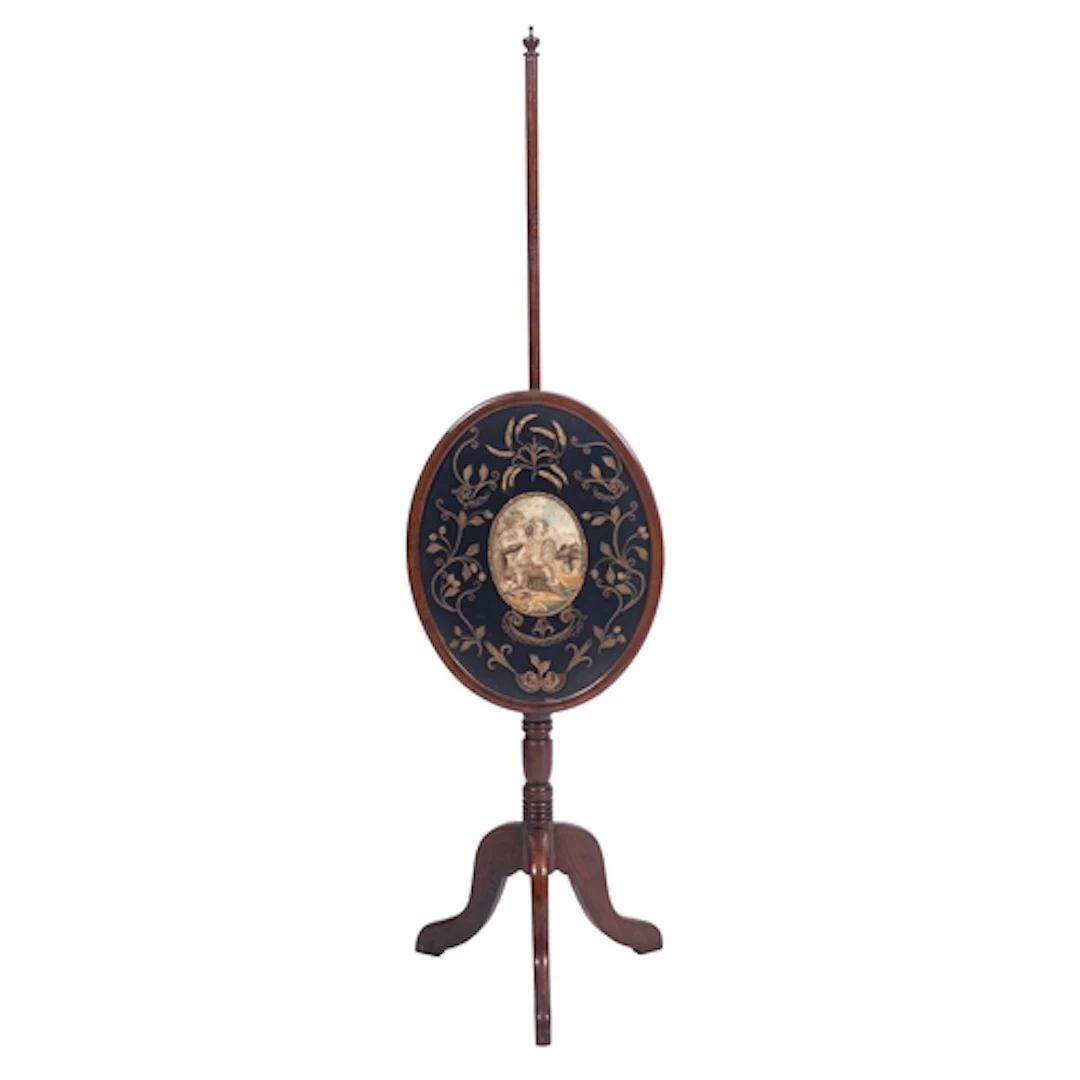 A late George III mahogany and silkwork pole screen, early 1...