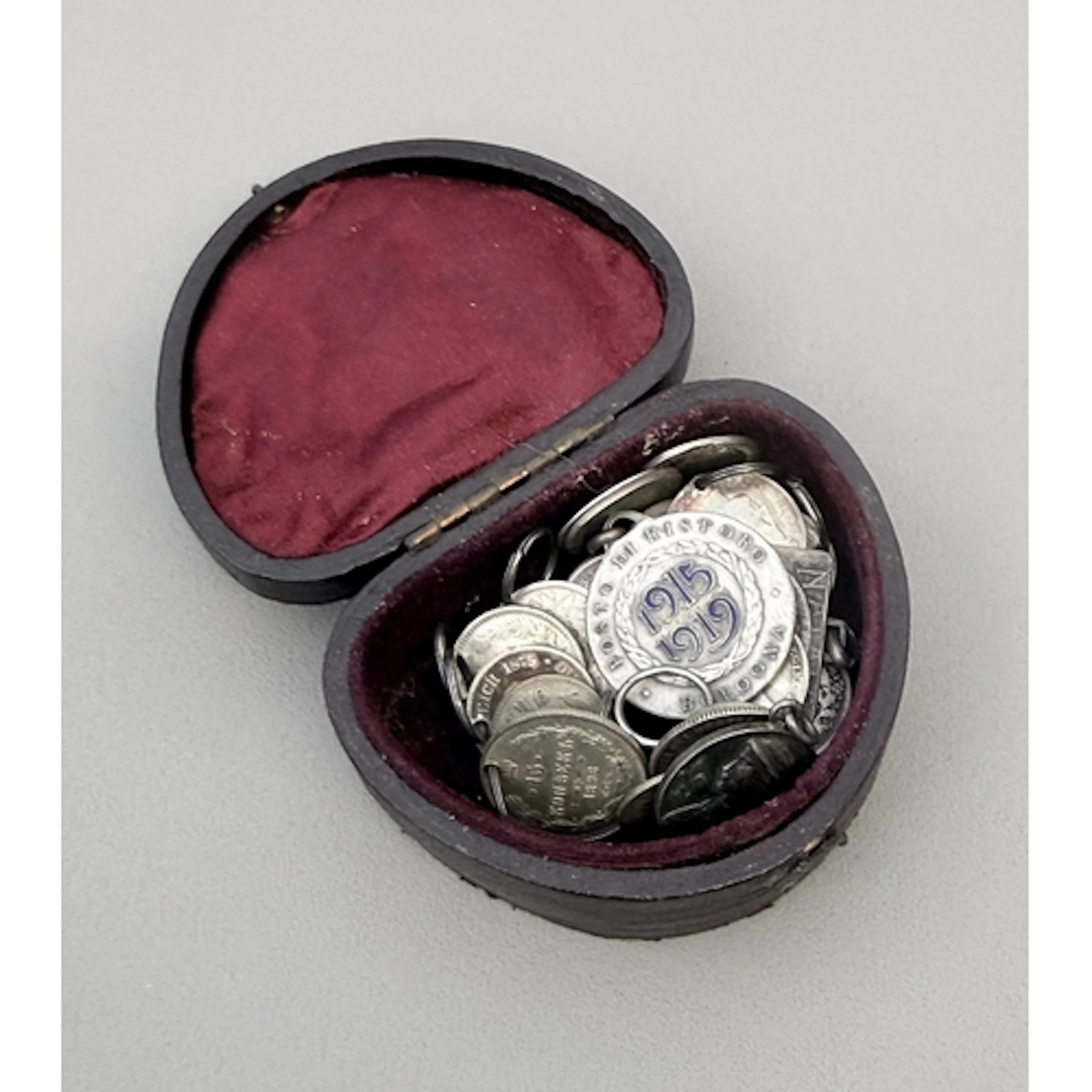 A small collection of 19th century silver coin pendants or c...
