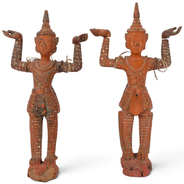 A pair of South East Asian carved and painted wood dancing f...