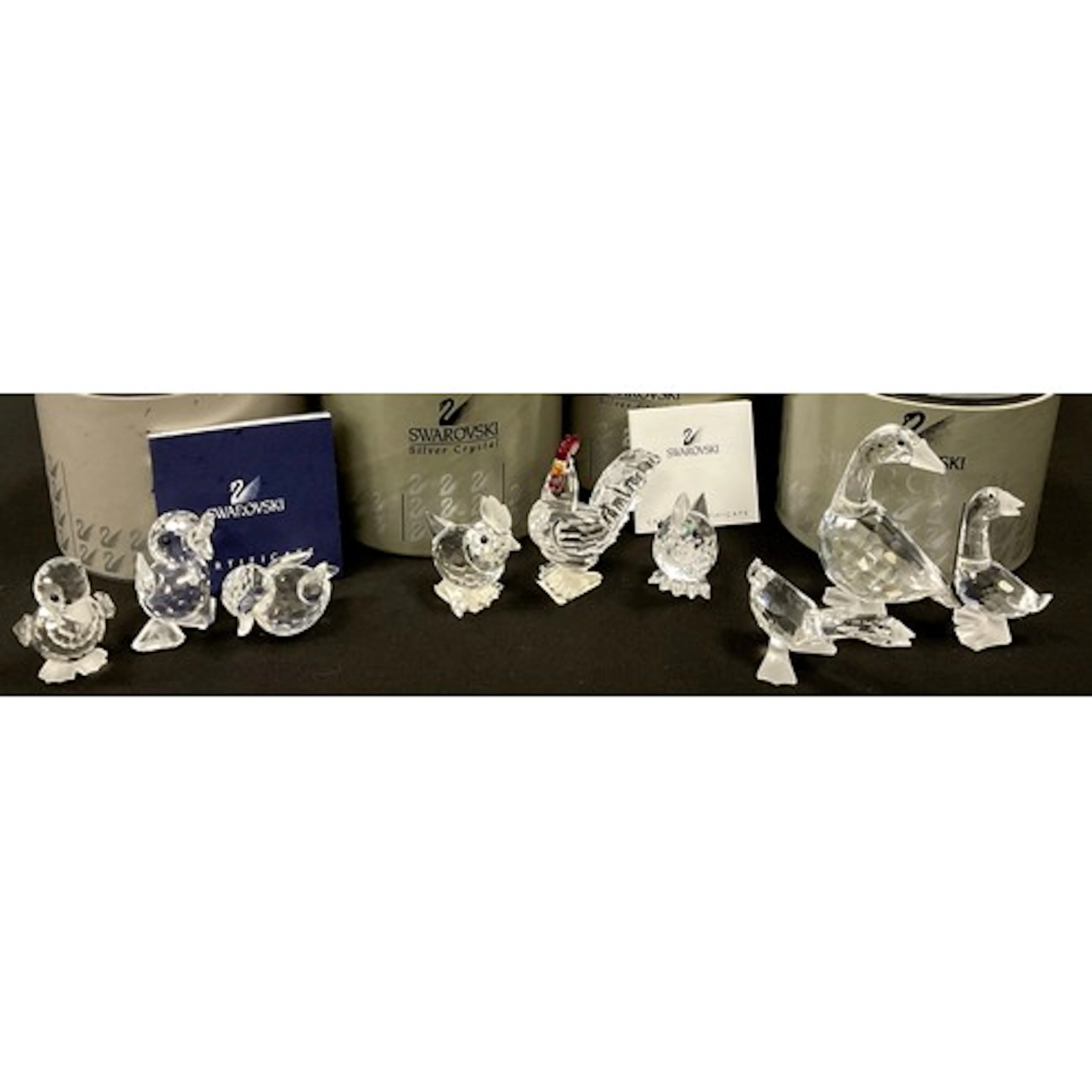 Swarovski crystal models including, a Cockerel, chickens, du...