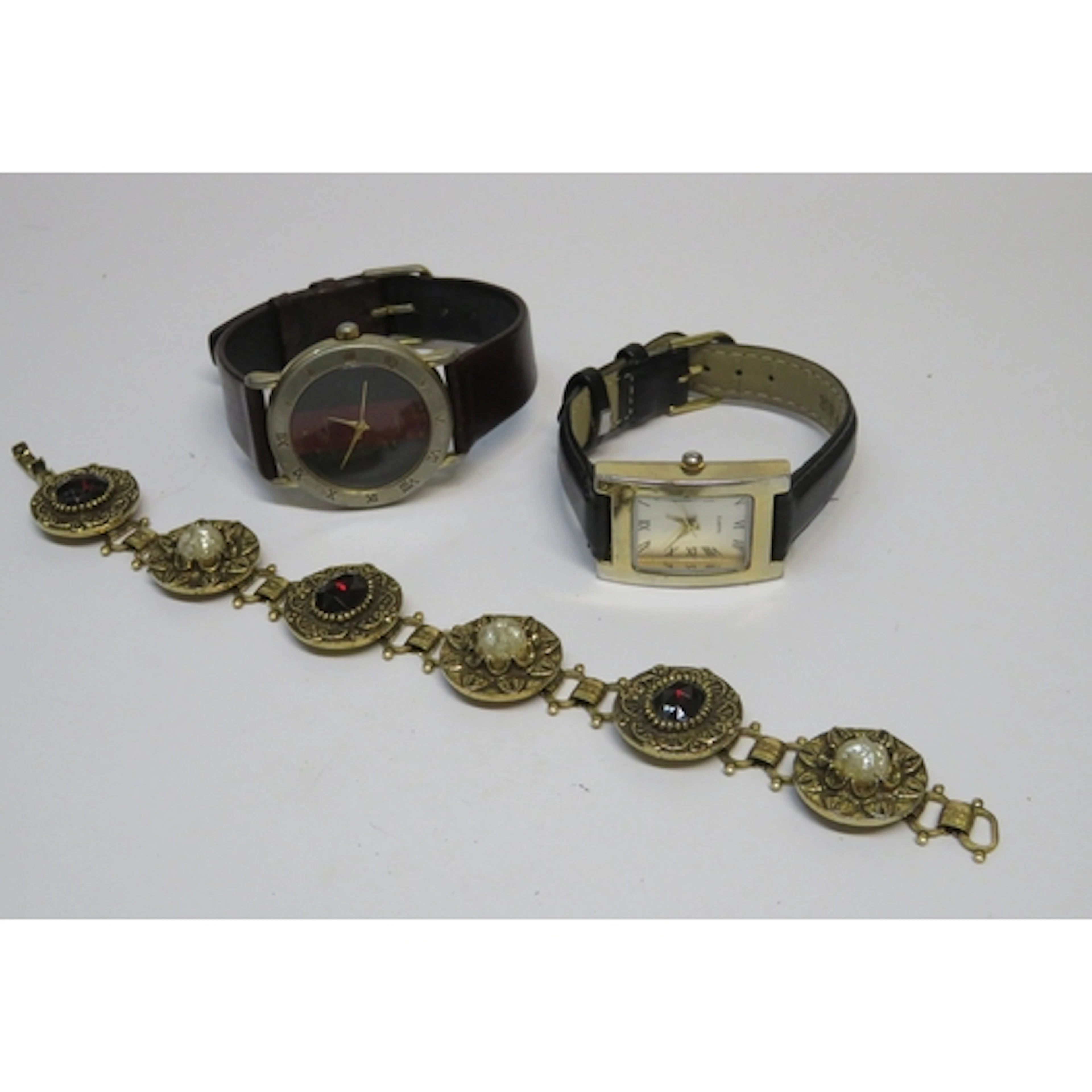 Two modern wristwatches, and a costume bracelet