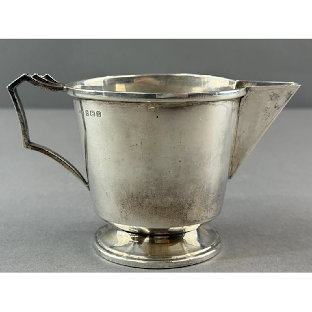 Silver: an Art Deco cream jug by Ernest W Haywood, Birmingha...