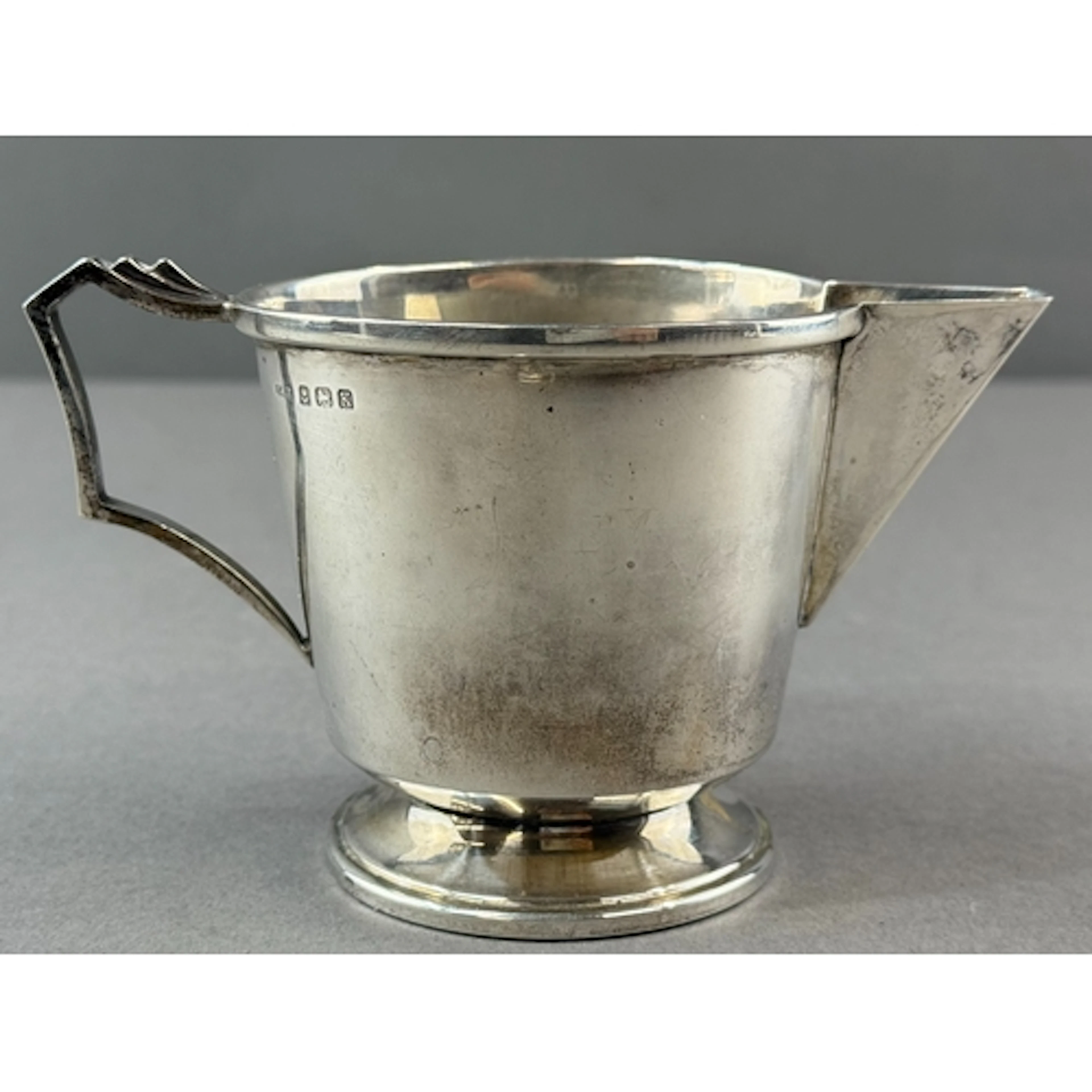 Silver: an Art Deco cream jug by Ernest W Haywood, Birmingha...