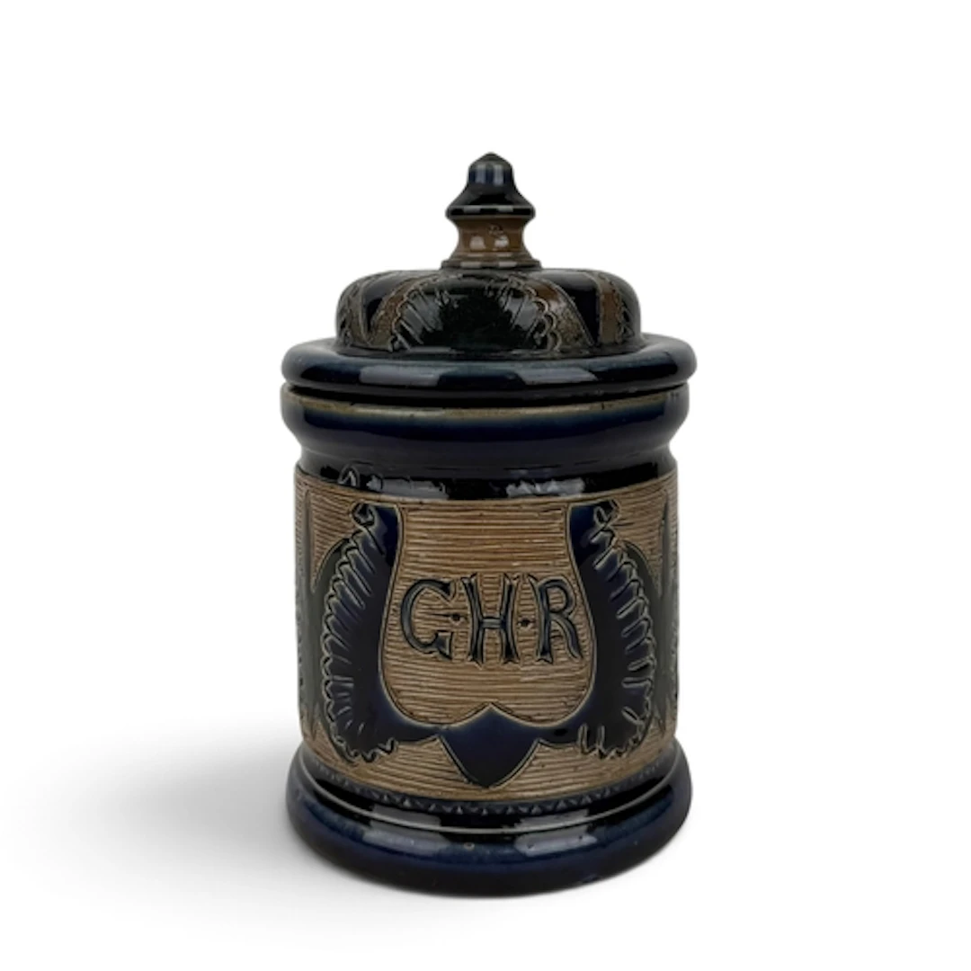 ATTRIBUTED TO C.I.C. BAILEY FULHAM POTTERY: A STONEWARE TOBA...