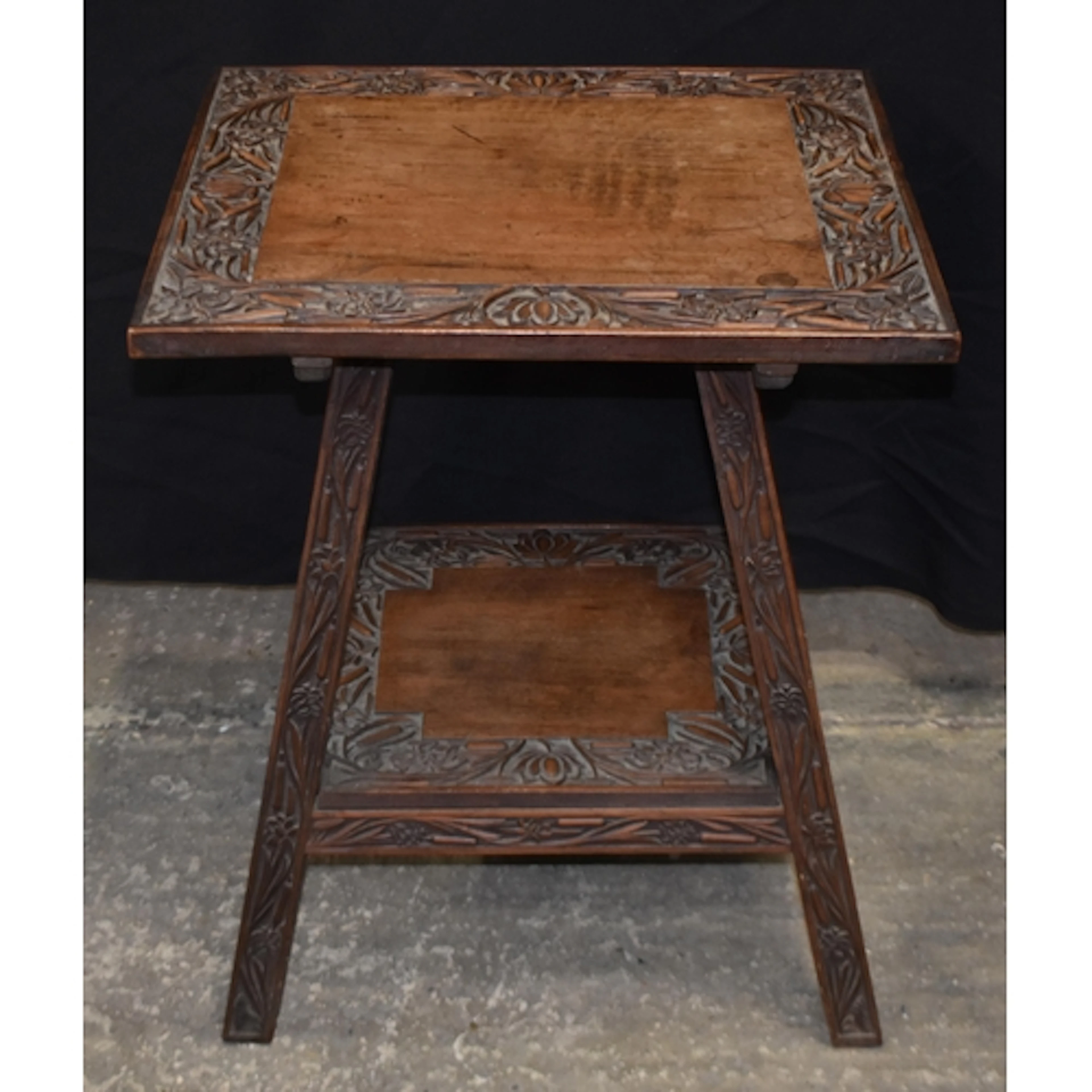 A late 19th Century Aesthetic period side table , carved wit...