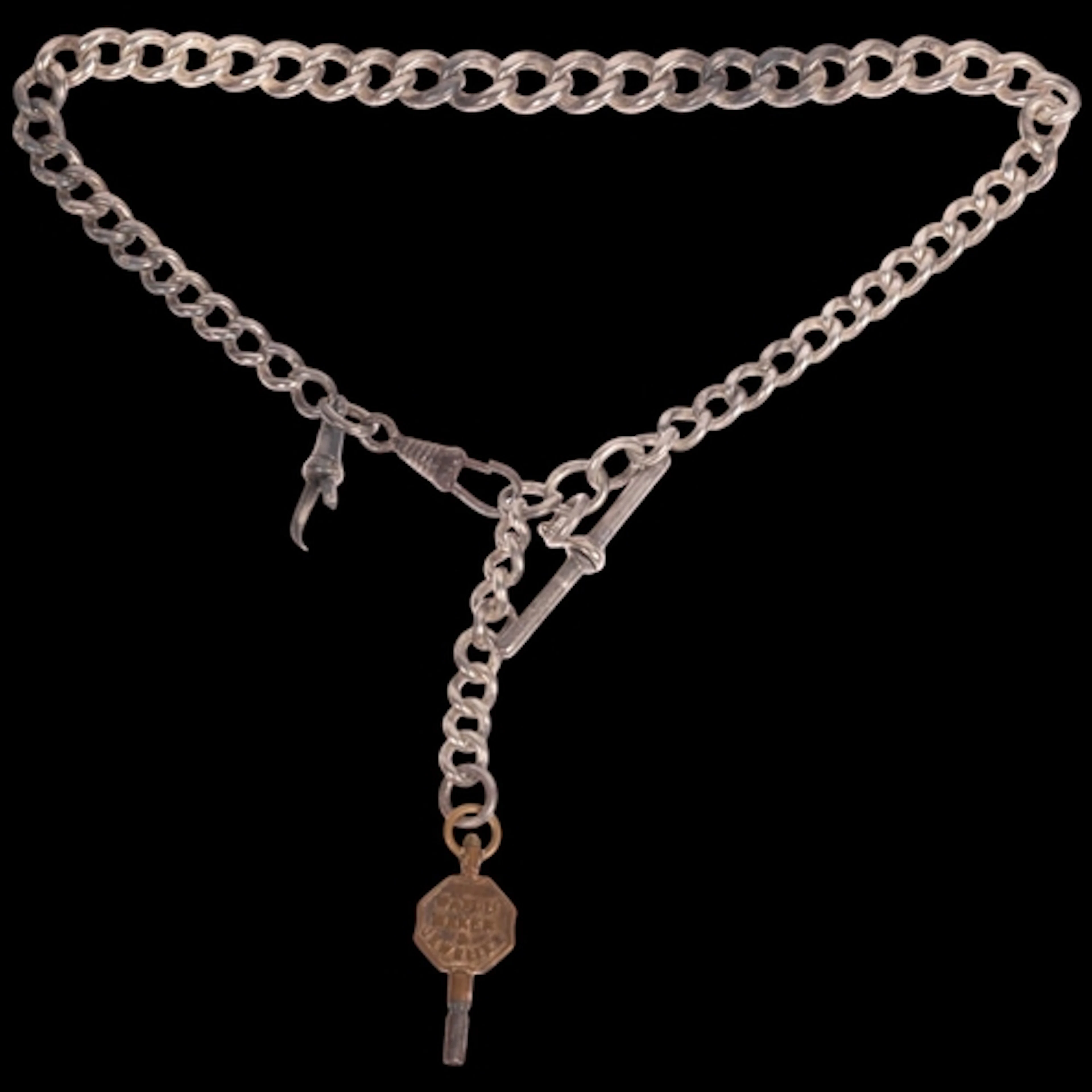 A heavy Victorian silver solid graduated curb link Albert ch...
